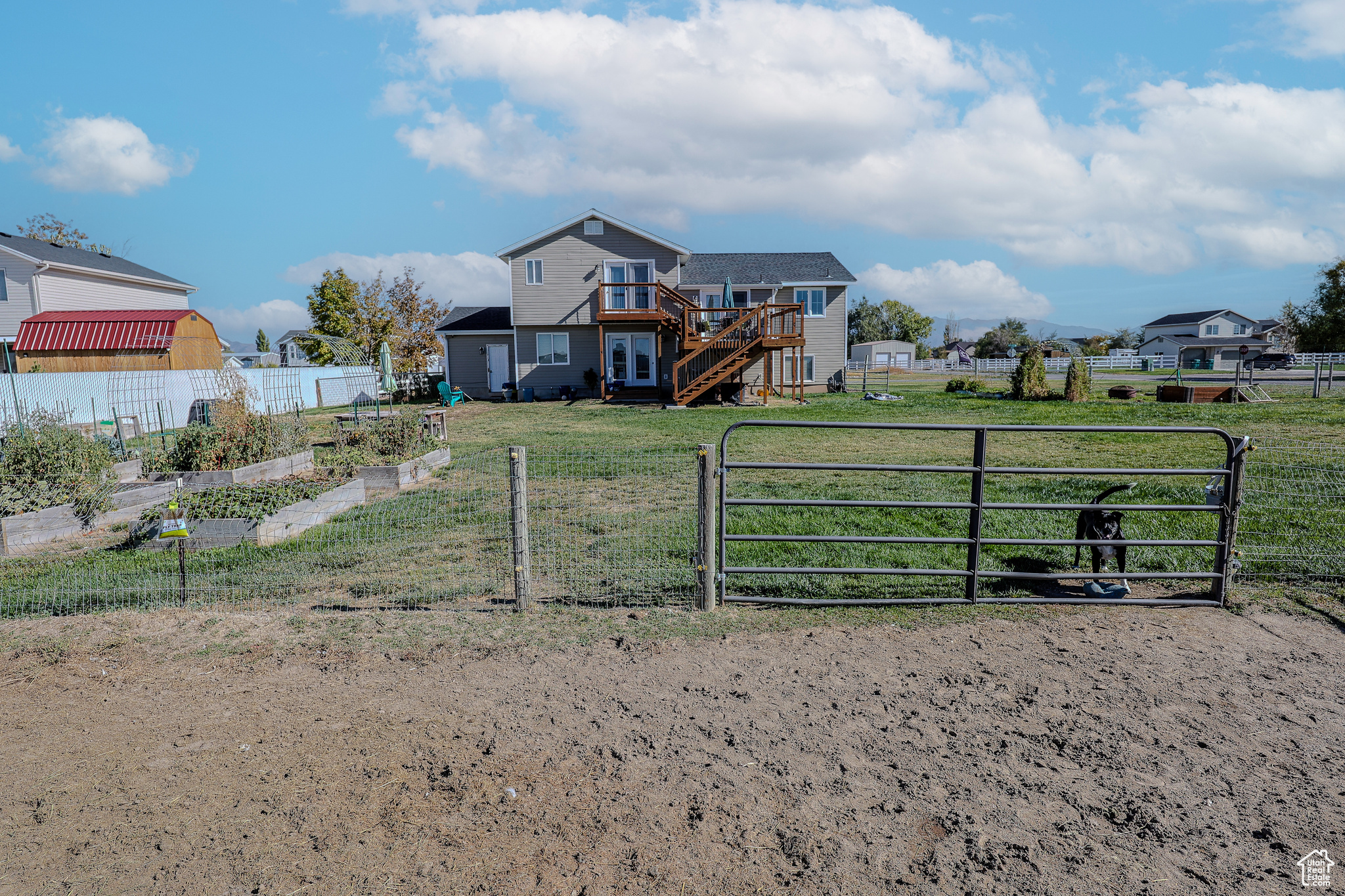 View of yard featuring a wooden deck