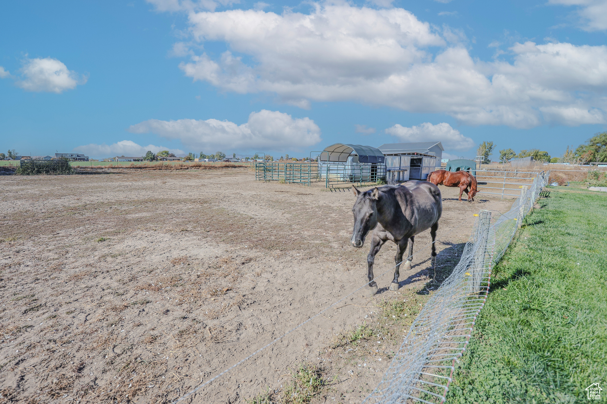 Exterior space with an outdoor structure and a rural view