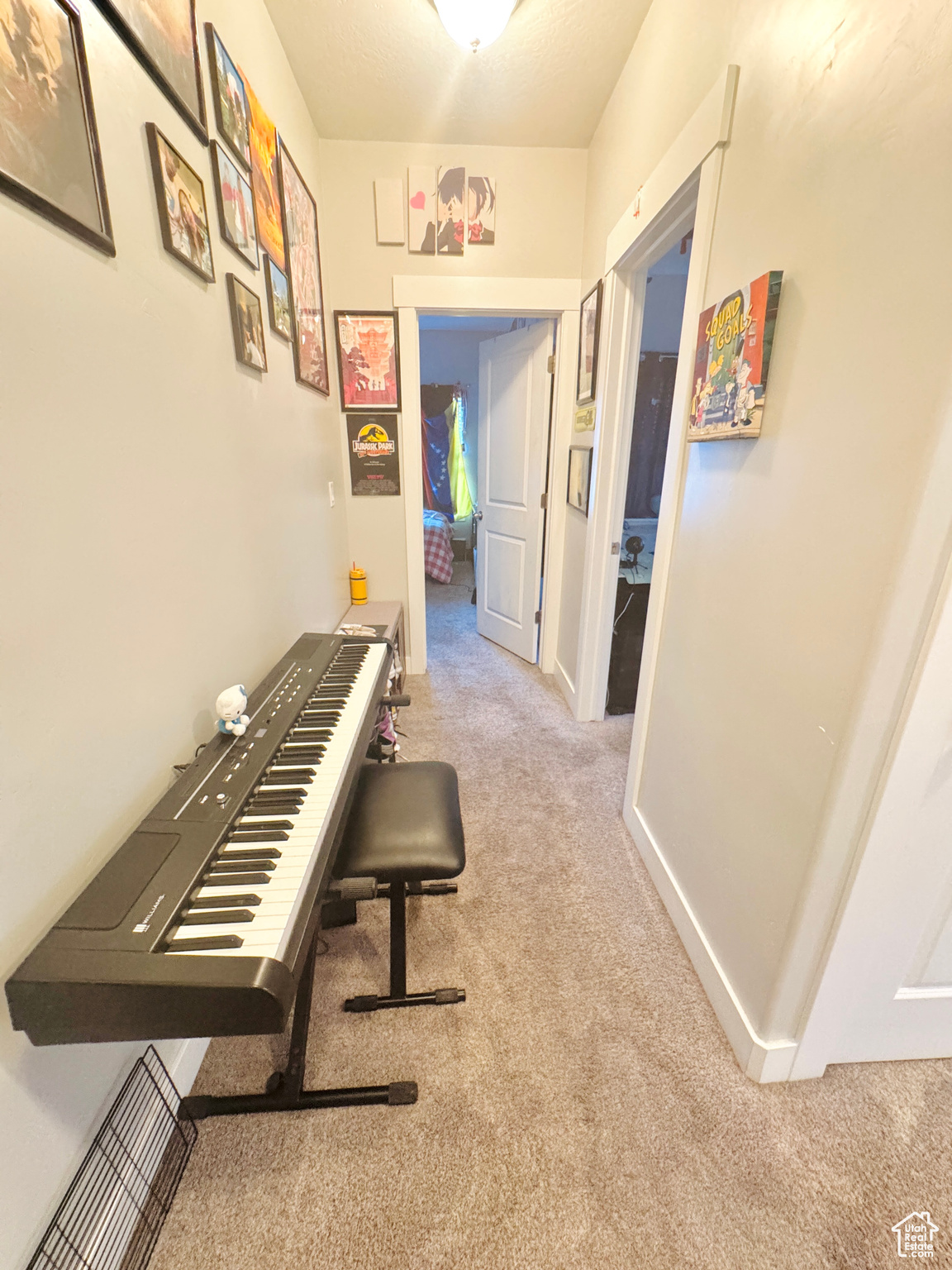 Hallway with carpet floors