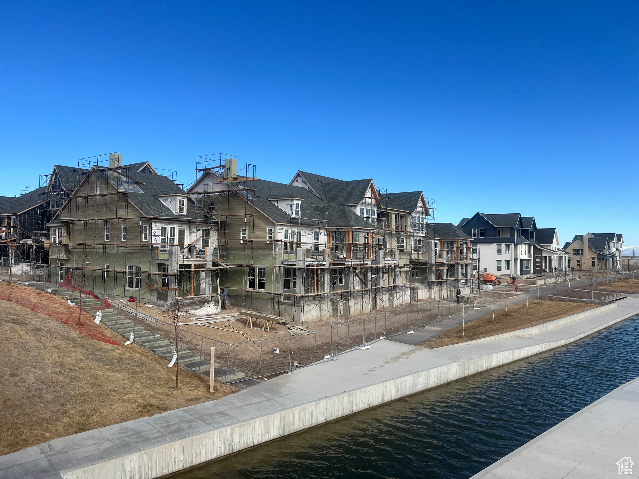 View of home's community featuring a residential view and a water view