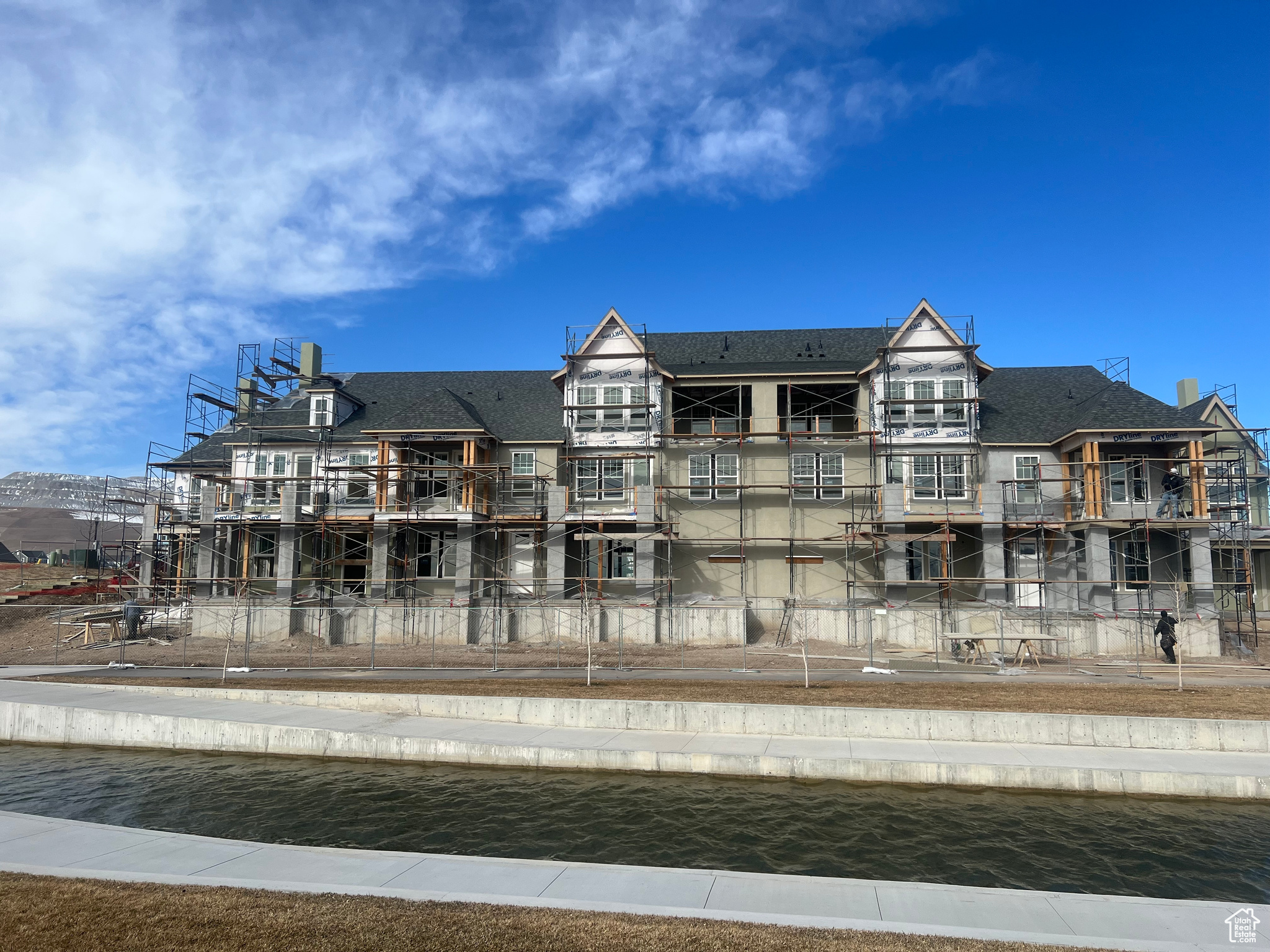 Back of house featuring a water view