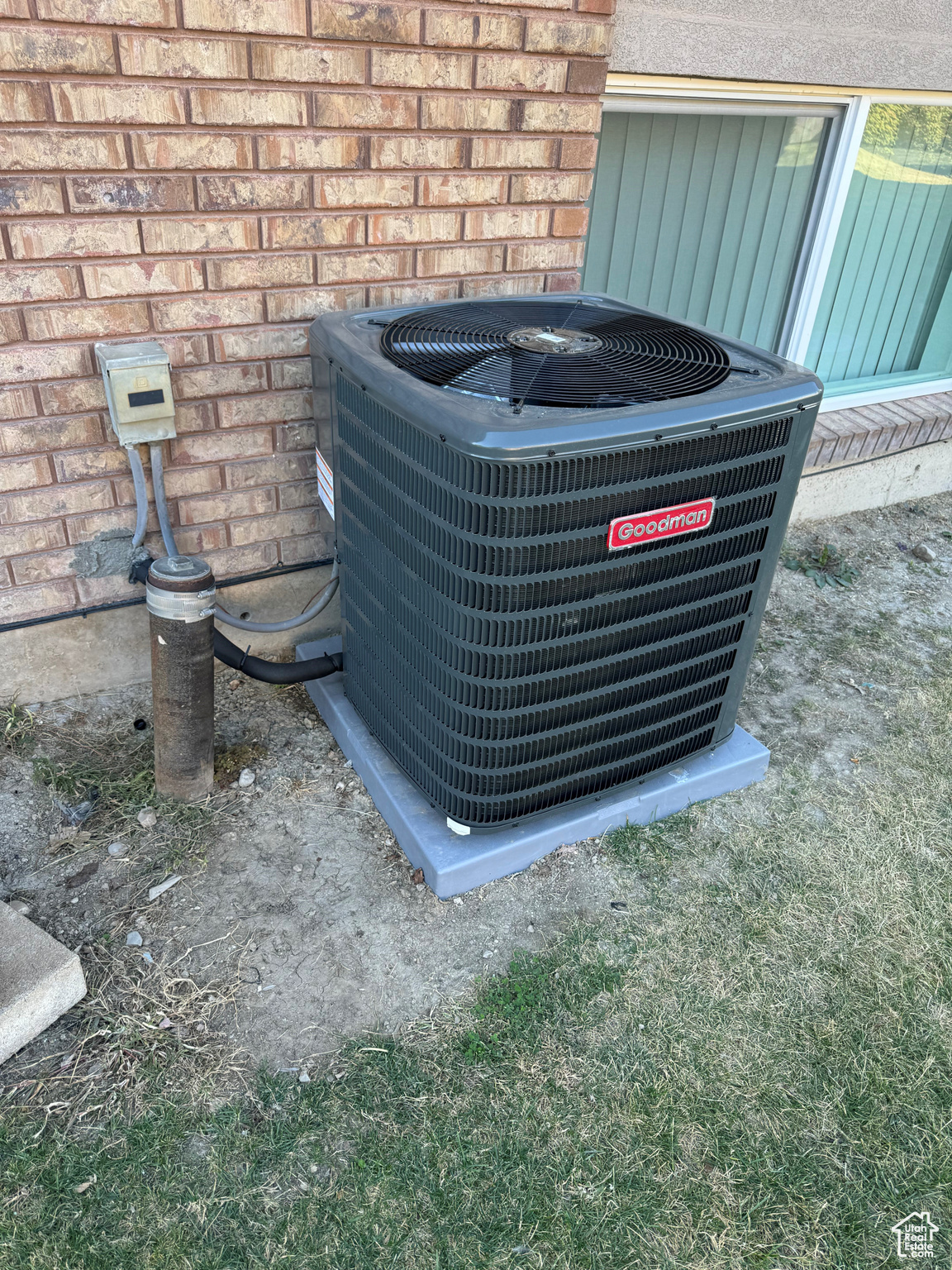 Exterior details featuring central AC unit