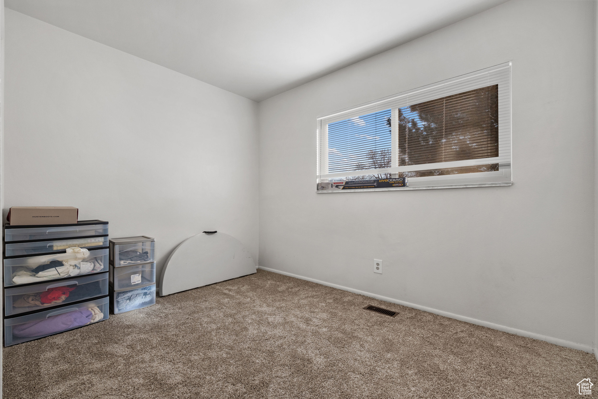 Empty room featuring carpet