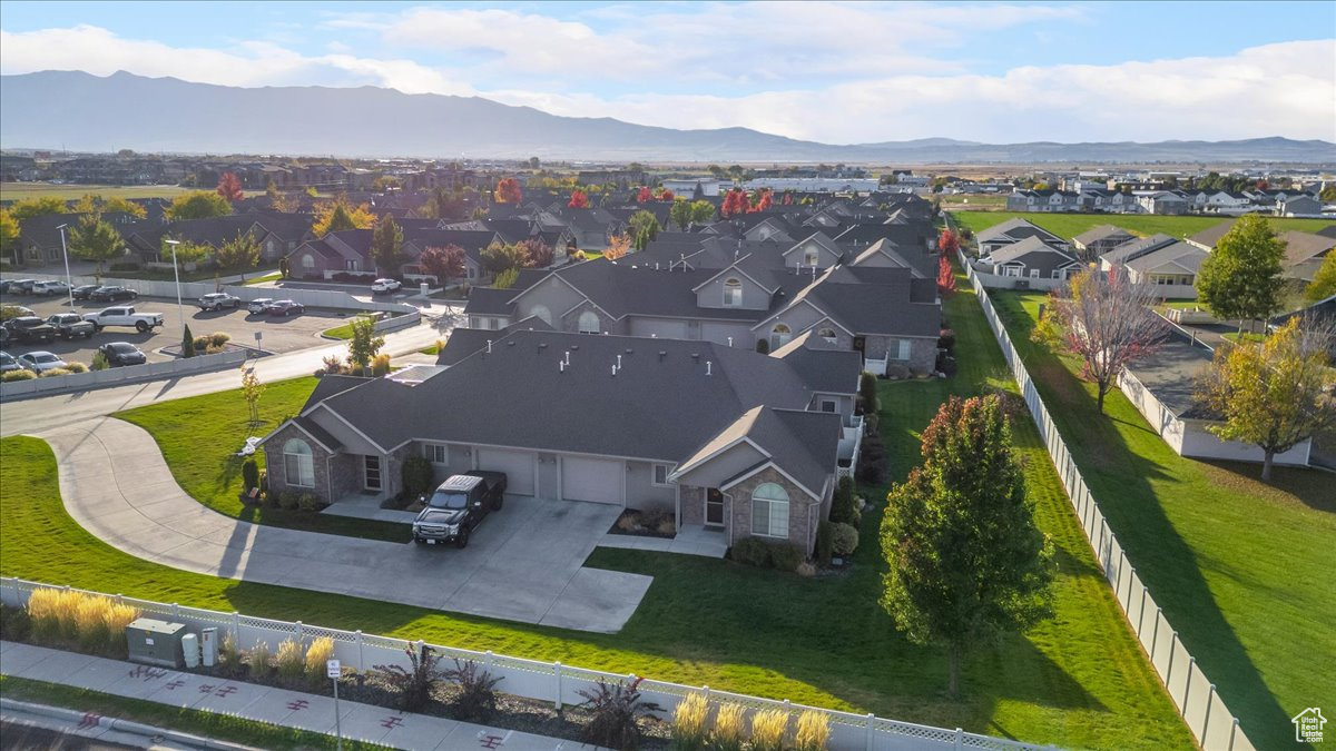 Birds eye view of property with a mountain view