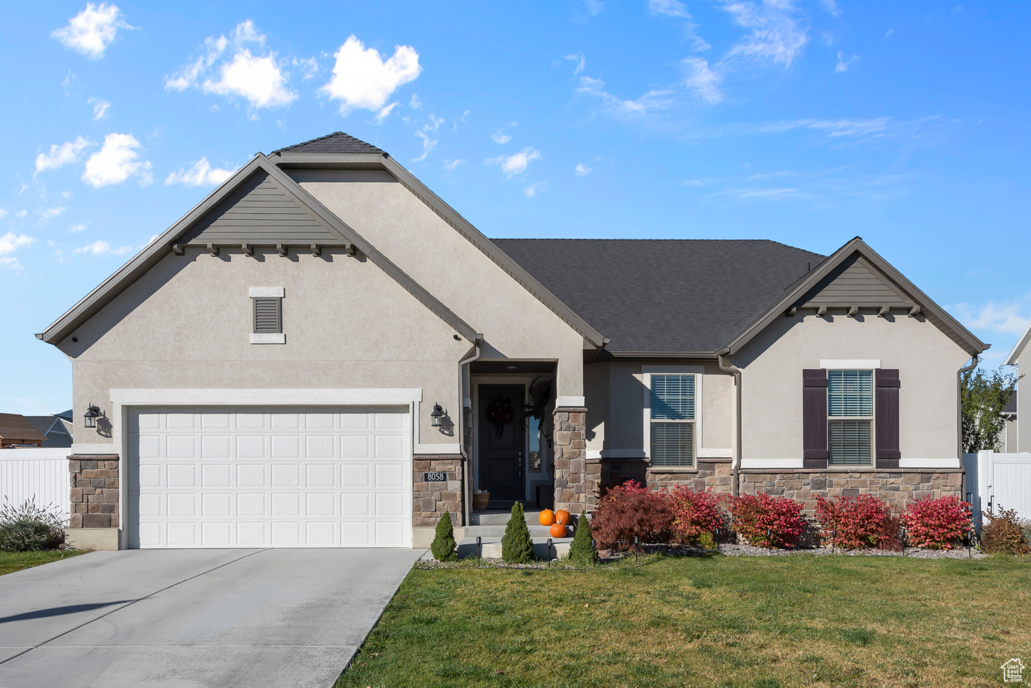 View of front of property with a front lawn