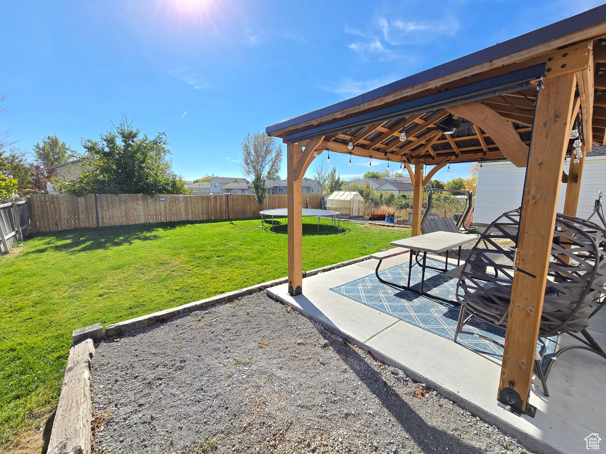 View of yard with a gazebo and a patio area