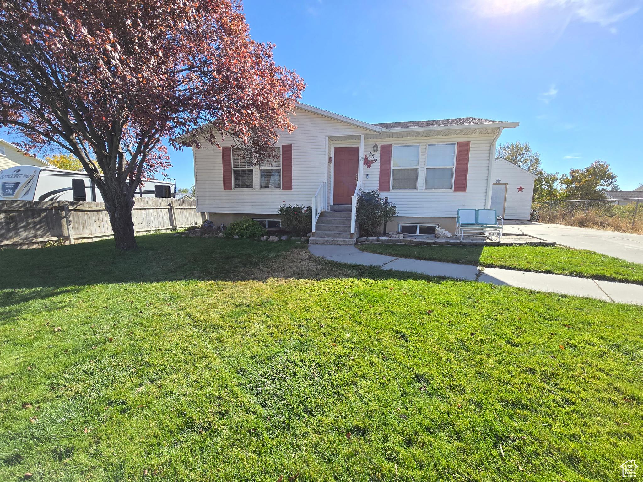 View of front of house featuring a front lawn