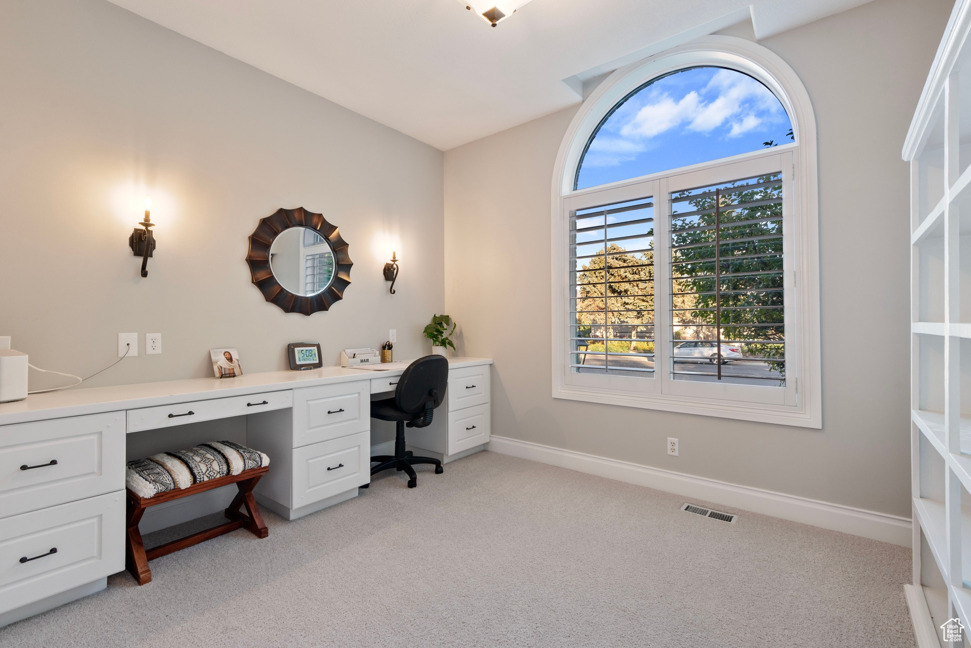 View of carpeted home office