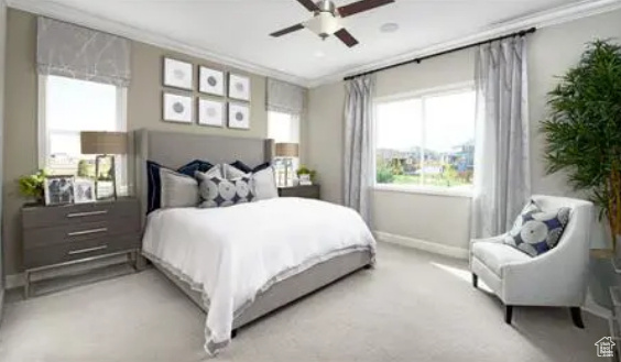 Carpeted bedroom featuring ceiling fan and ornamental molding. Photos are of a Decker plan but not the subject property.