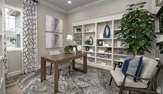 Office featuring crown molding and wood-type flooring. Photos are of a Decker plan but not the subject property.