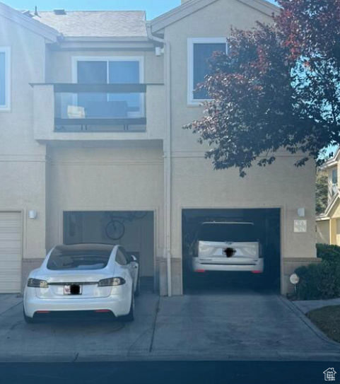 View of front of home featuring a garage