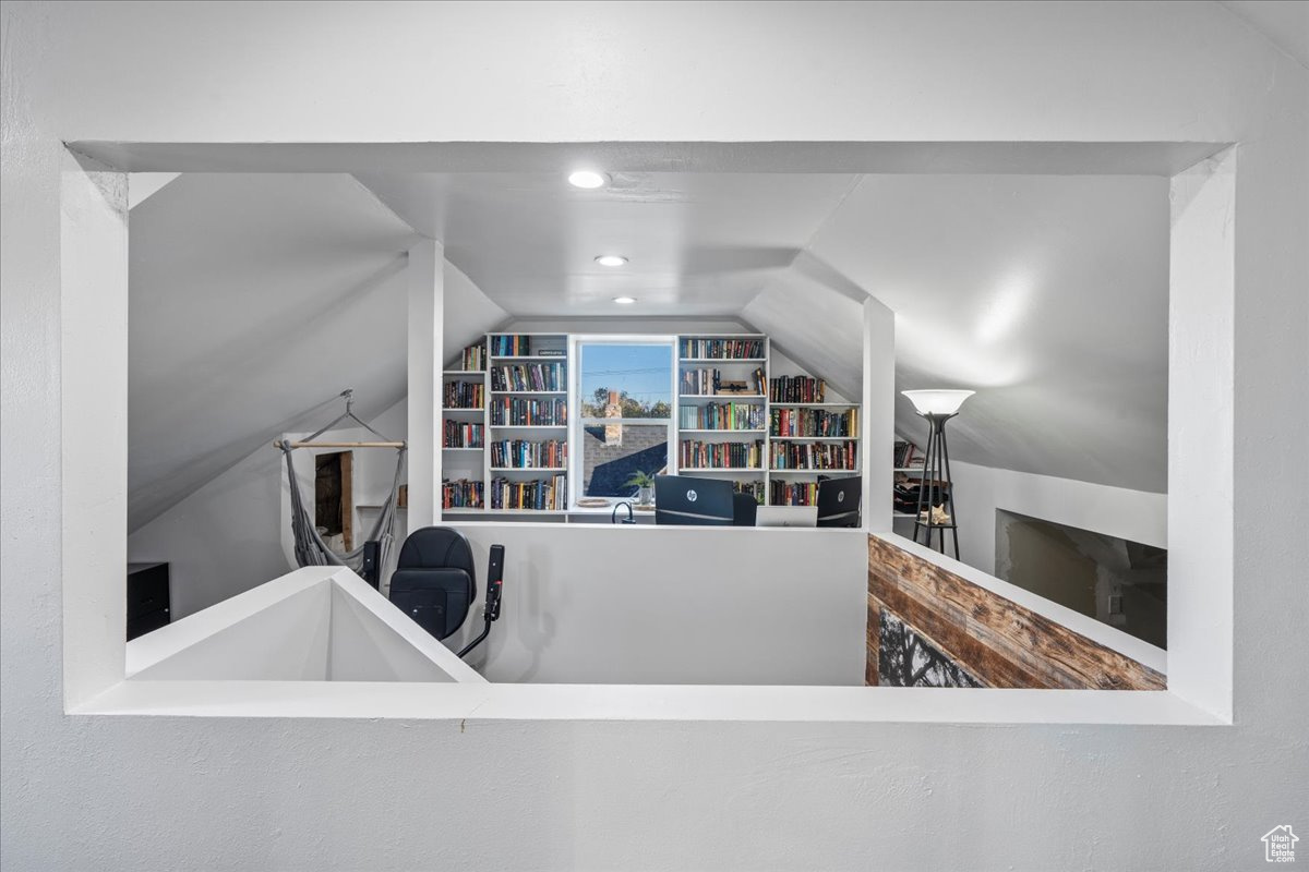 Office featuring lofted ceiling