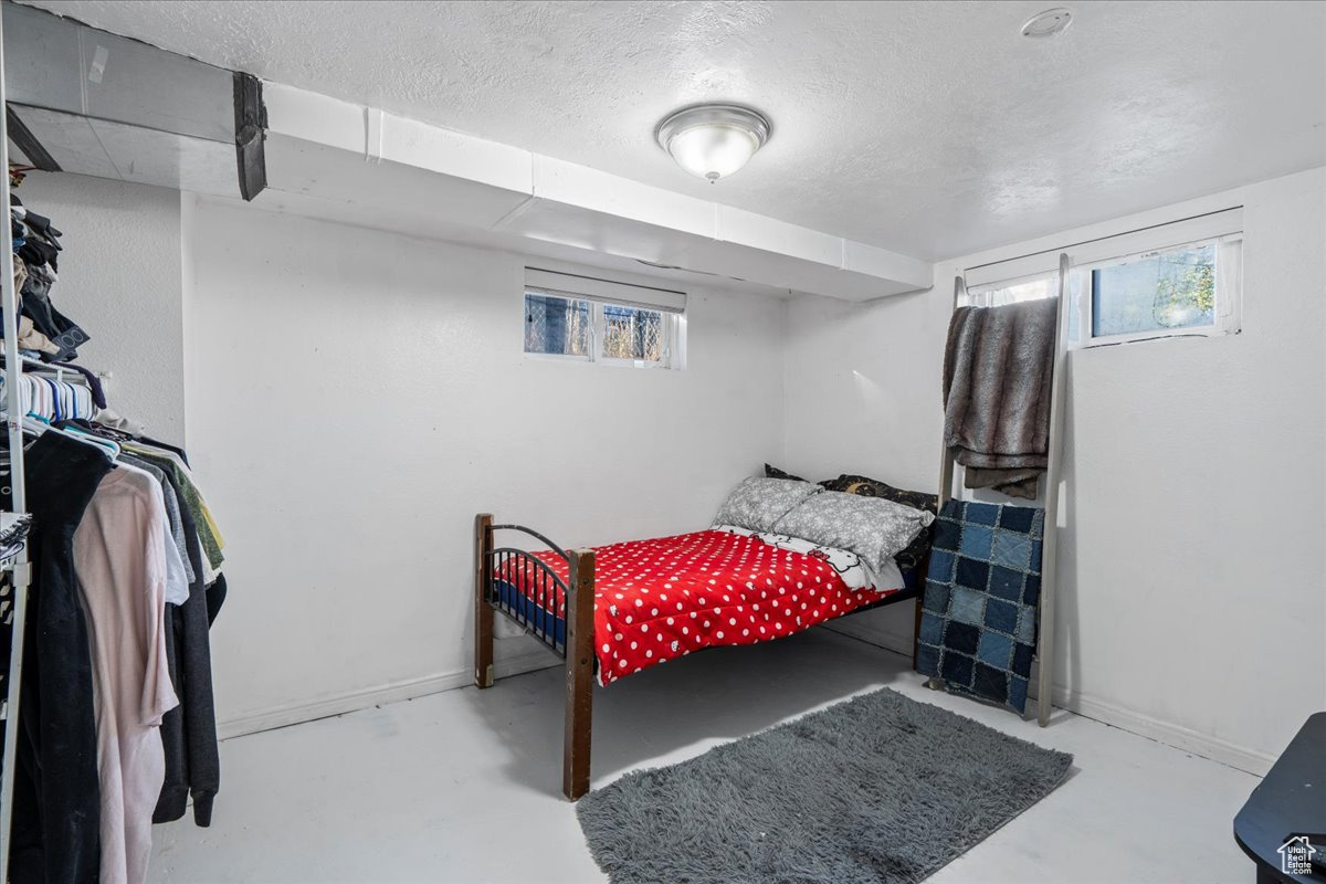 Bedroom featuring a textured ceiling