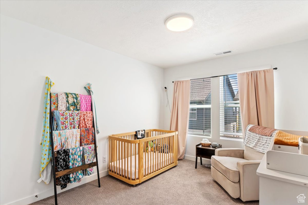 Carpeted bedroom