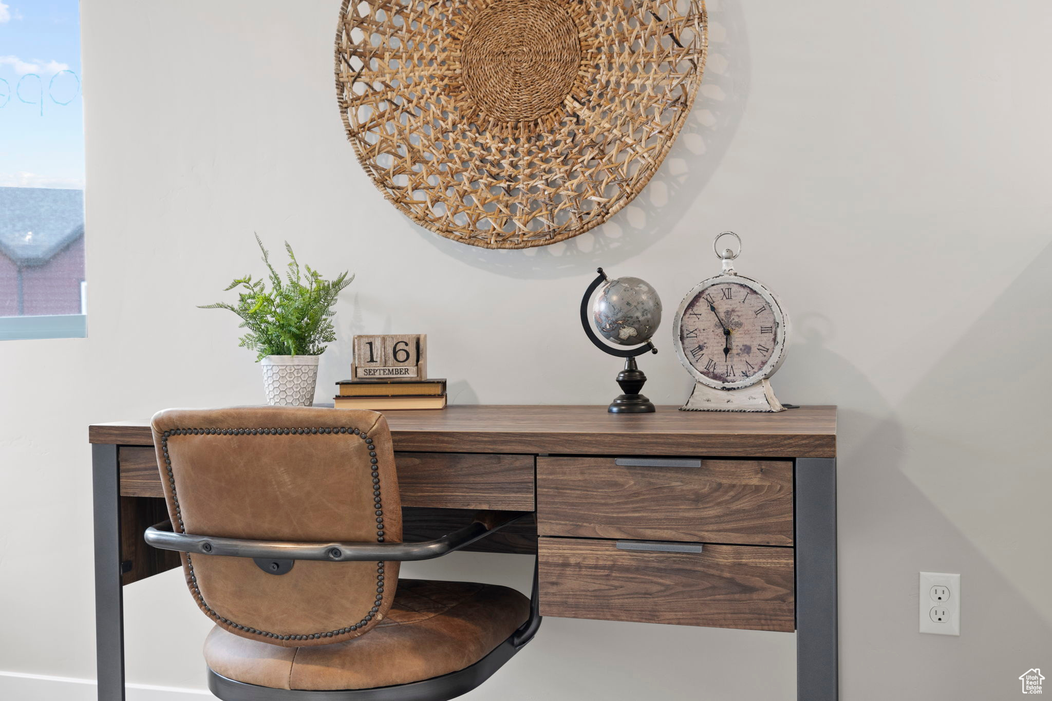 Home office with built in desk and plenty of natural light