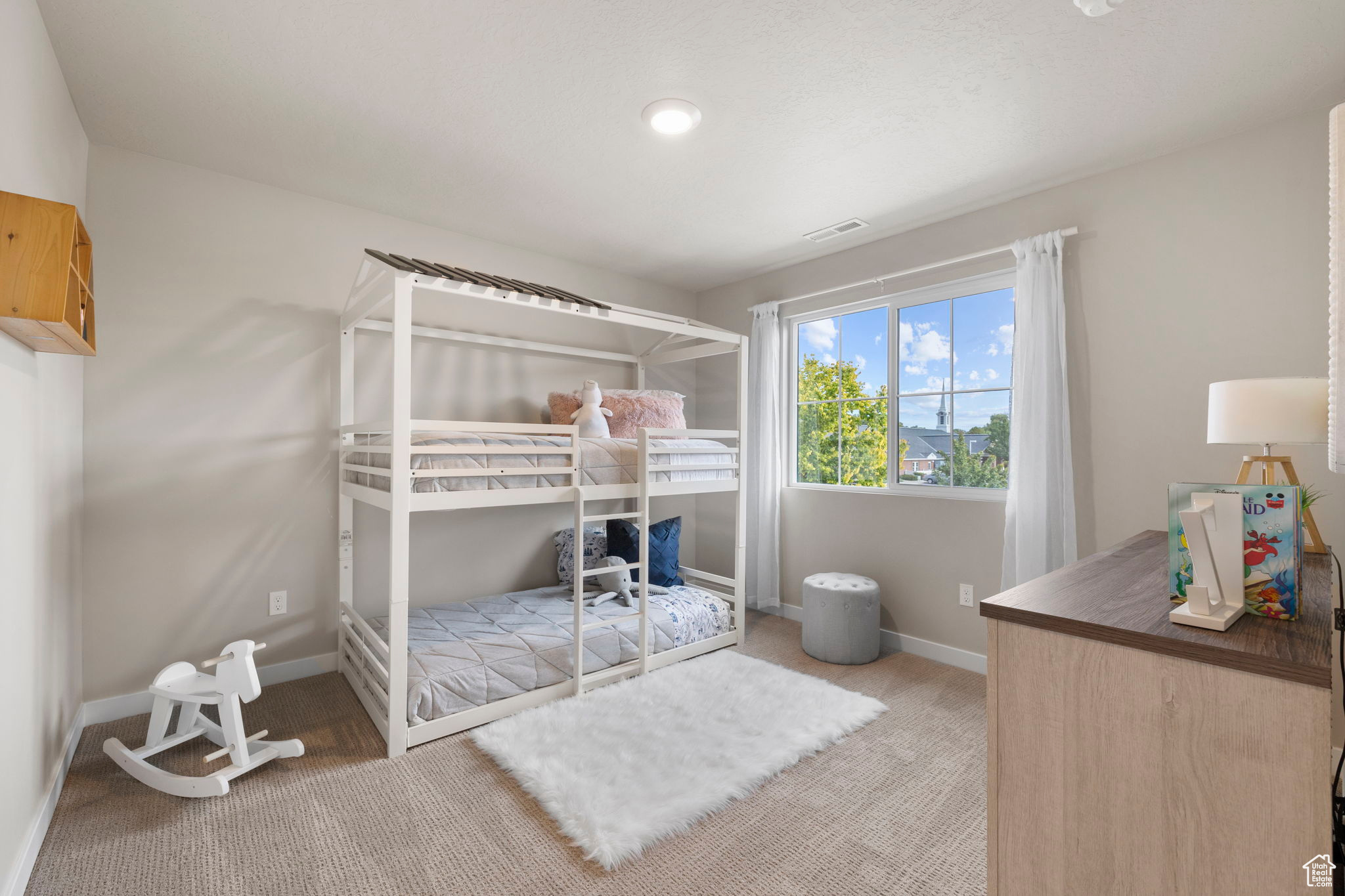 Bedroom featuring carpet