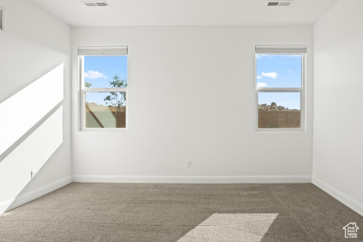 Spare room with carpet flooring