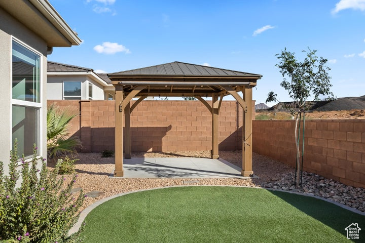 View of yard with a patio and a gazebo