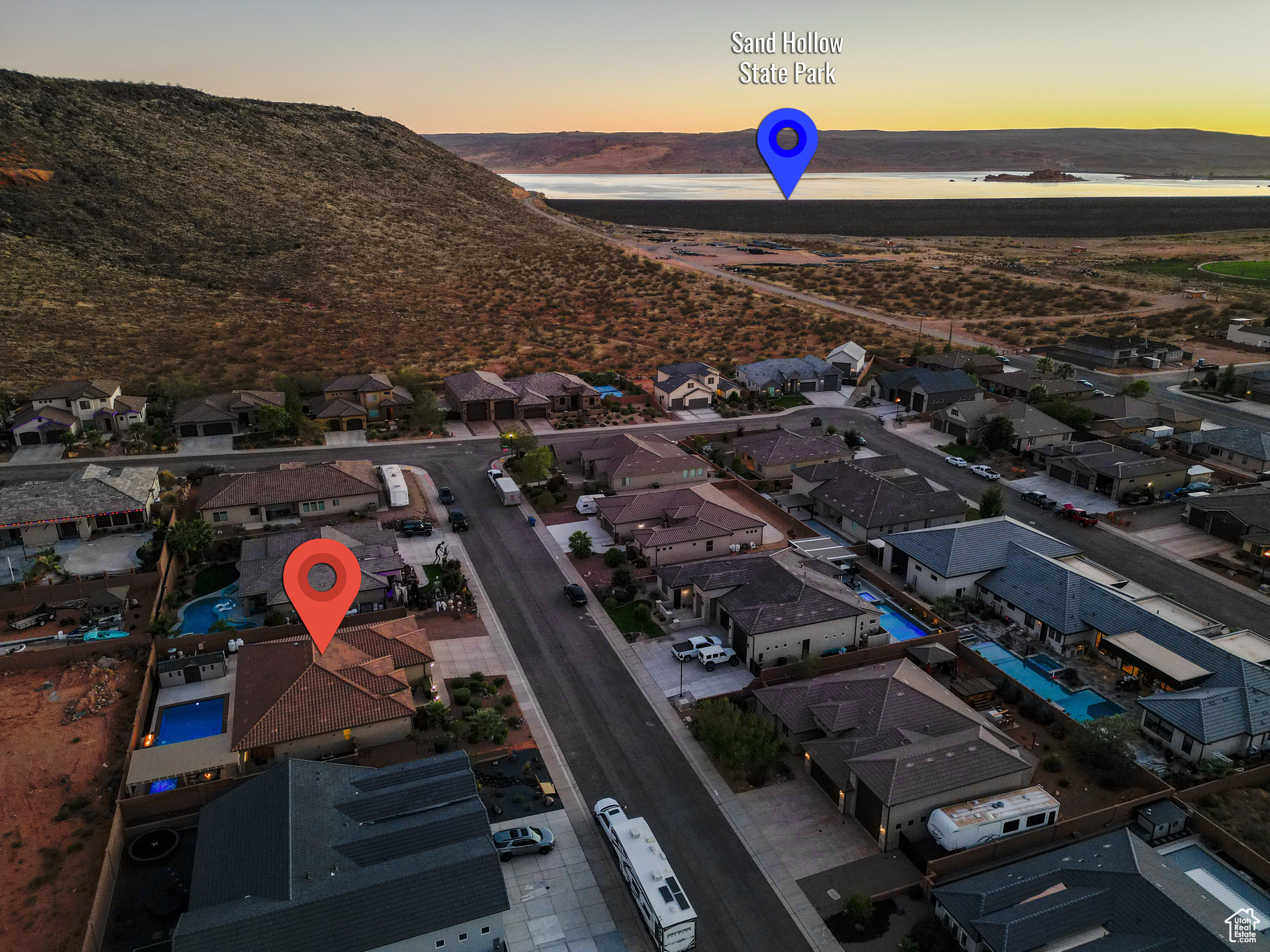 Aerial view at dusk featuring a mountain view