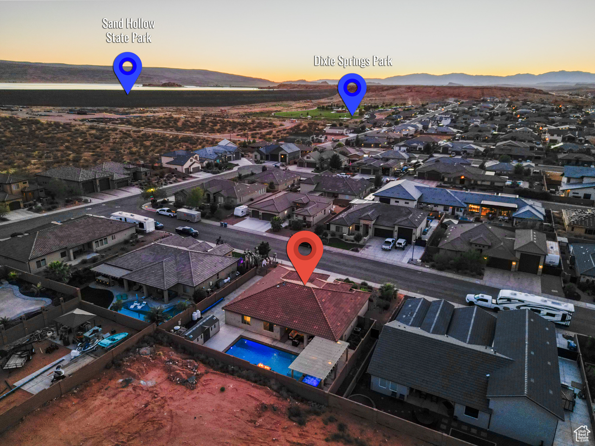 Aerial view at dusk featuring a mountain view