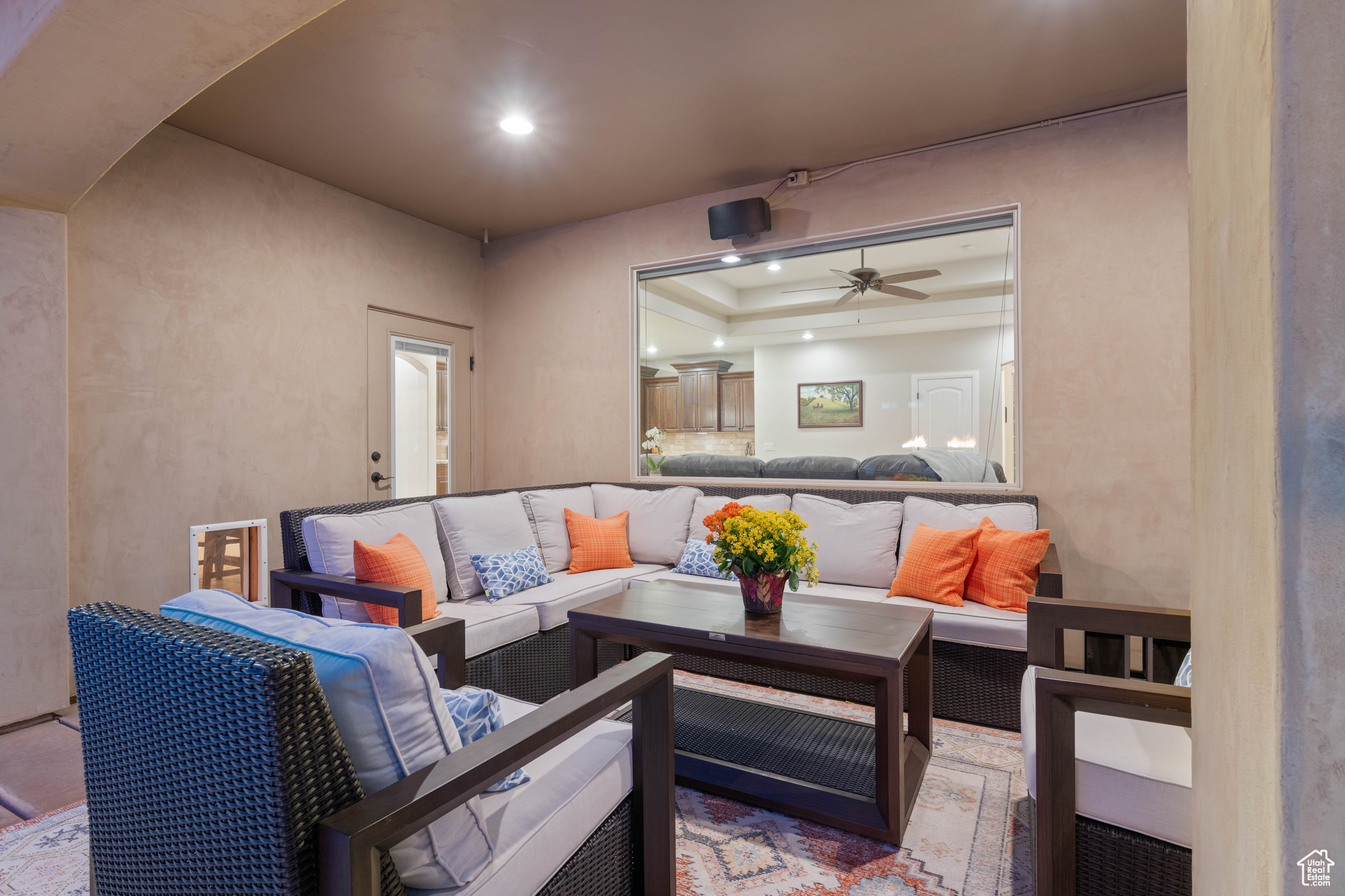 View of patio / terrace with an outdoor living space and ceiling fan