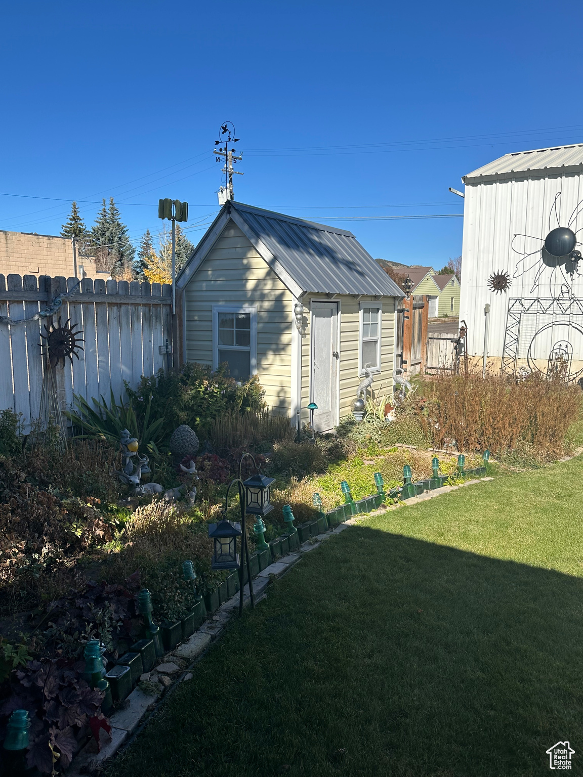 Exterior space featuring a storage shed