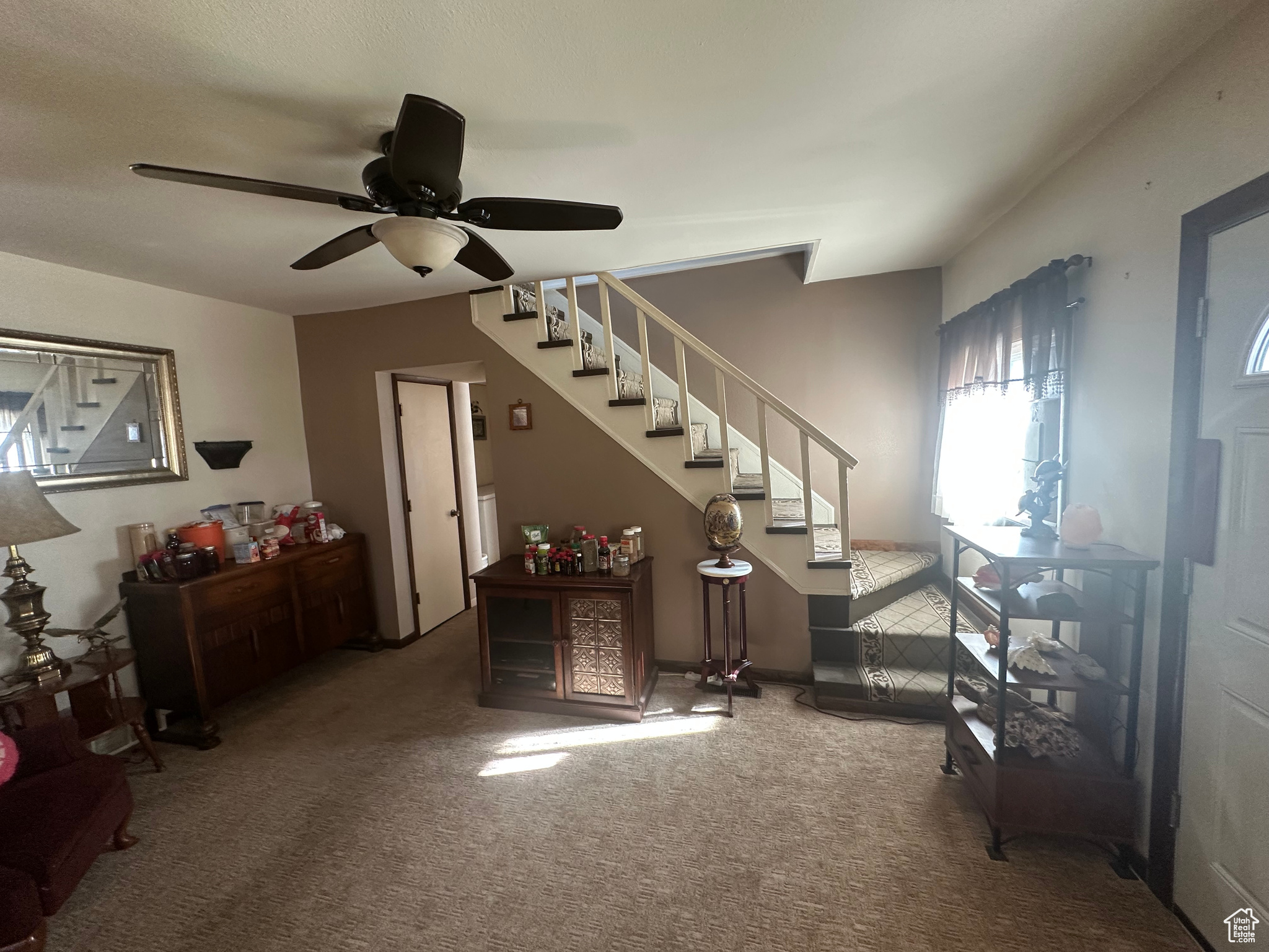 Interior space featuring ceiling fan