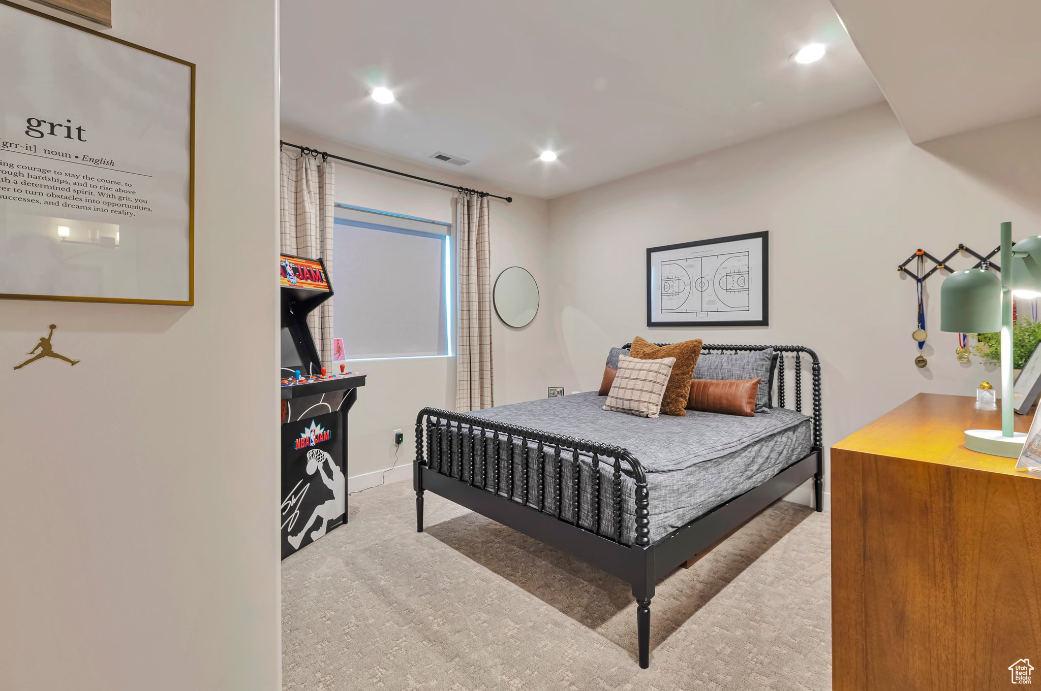 Bedroom with light colored carpet