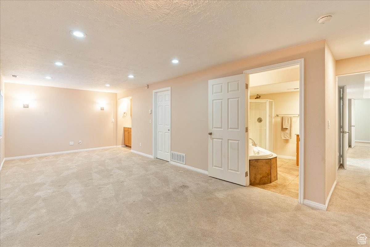 Interior space featuring a textured ceiling