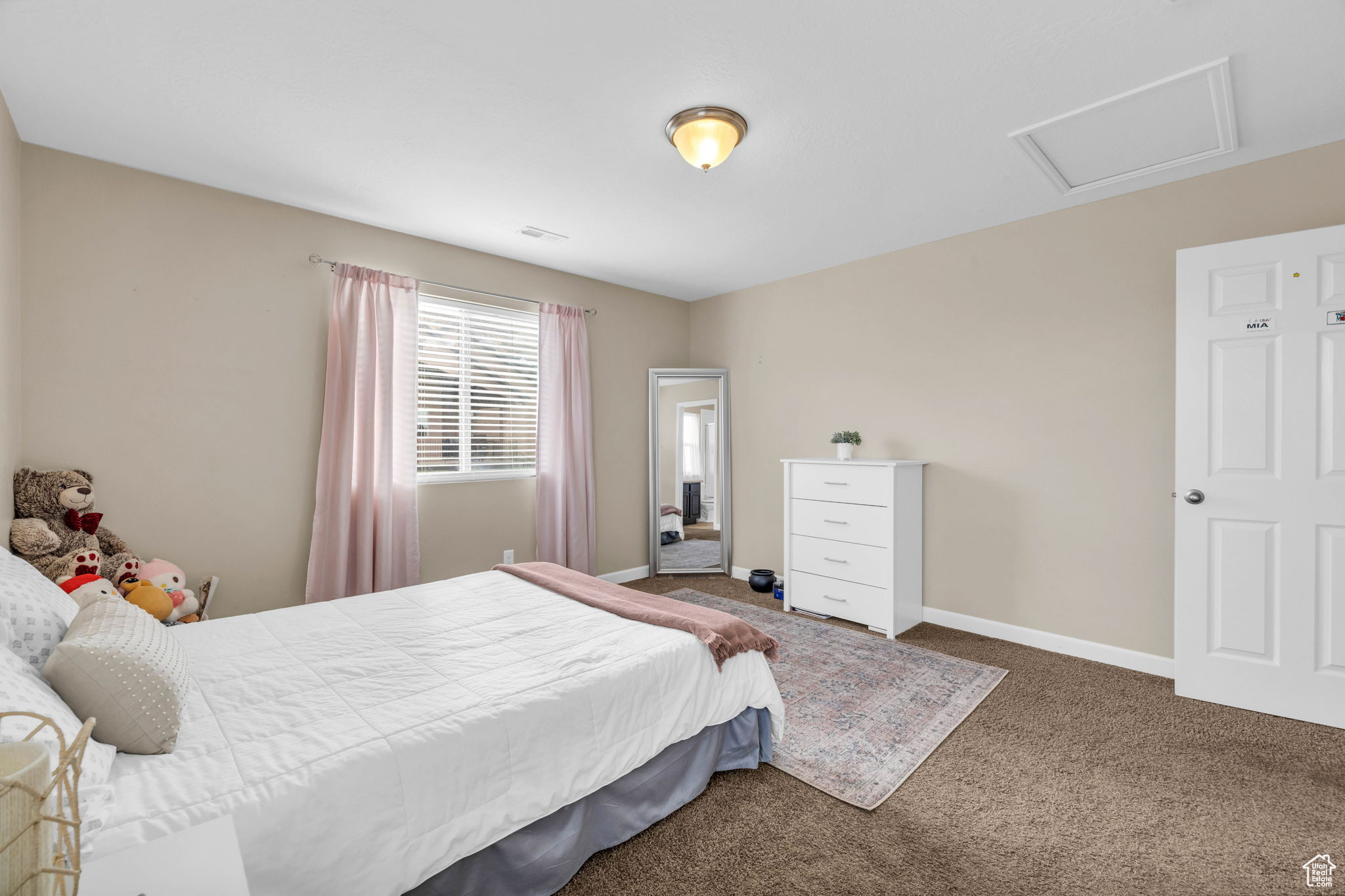 Bedroom featuring carpet