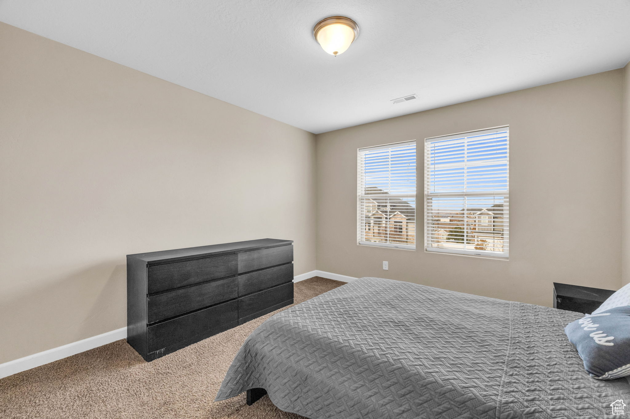 Bedroom featuring carpet floors