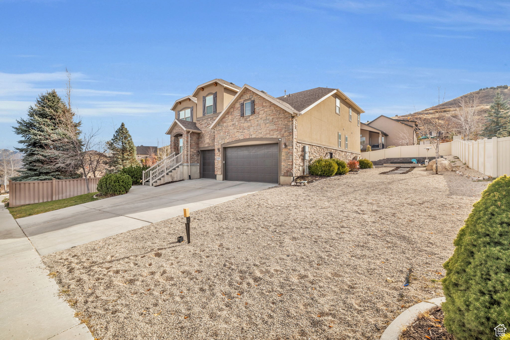 View of front of property with a garage