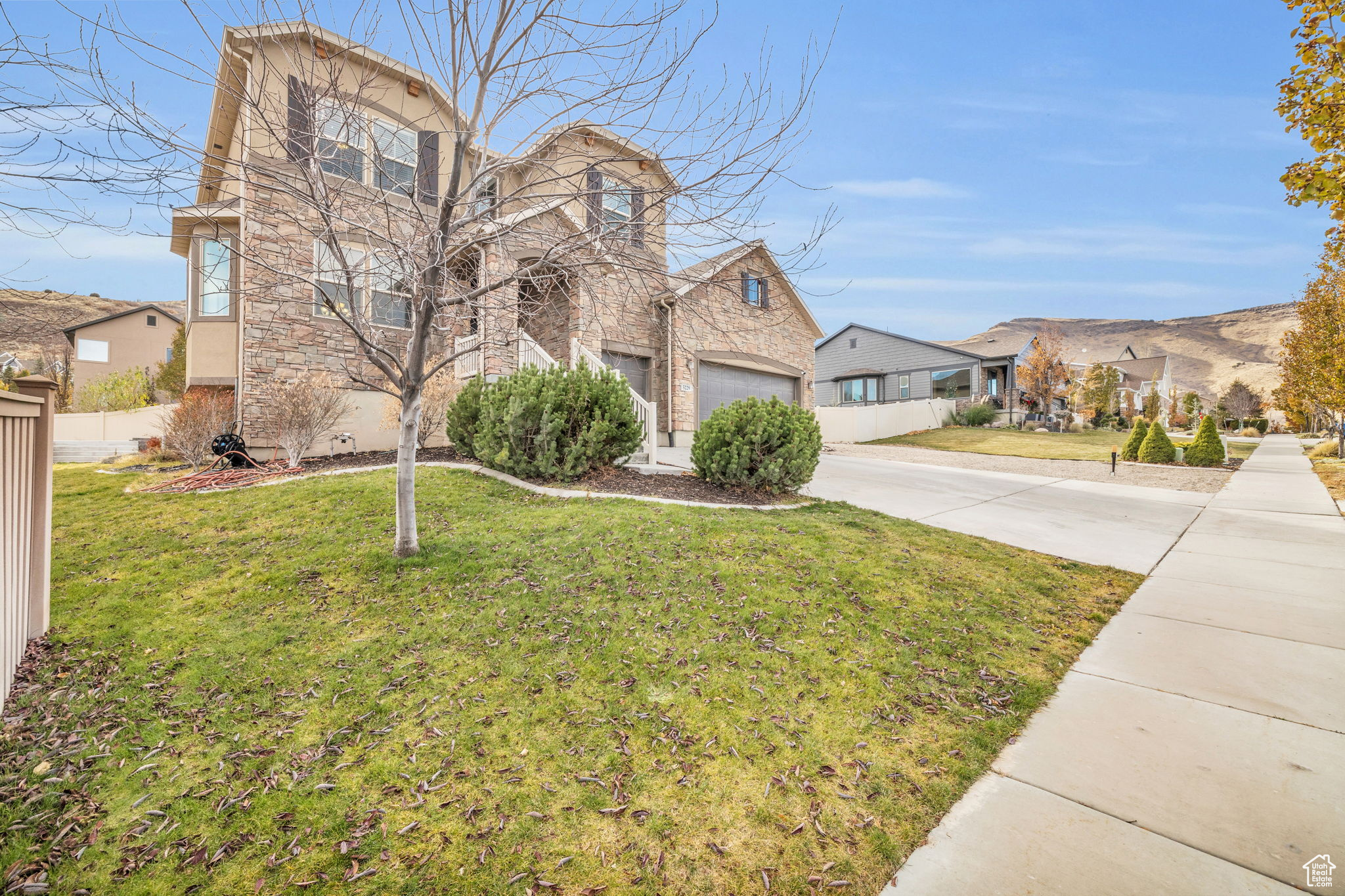 View of front of property with a front lawn