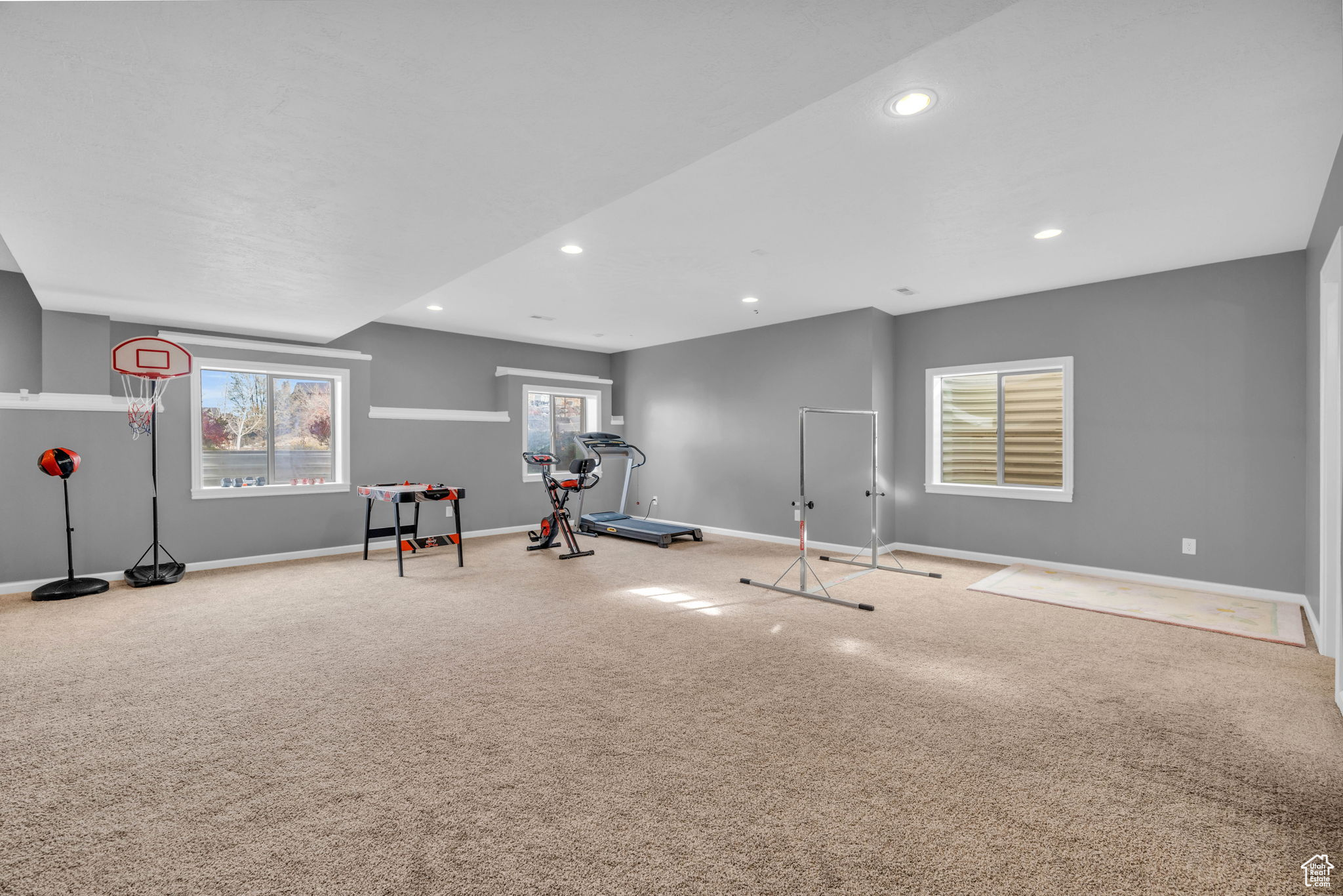 Workout room with carpet flooring