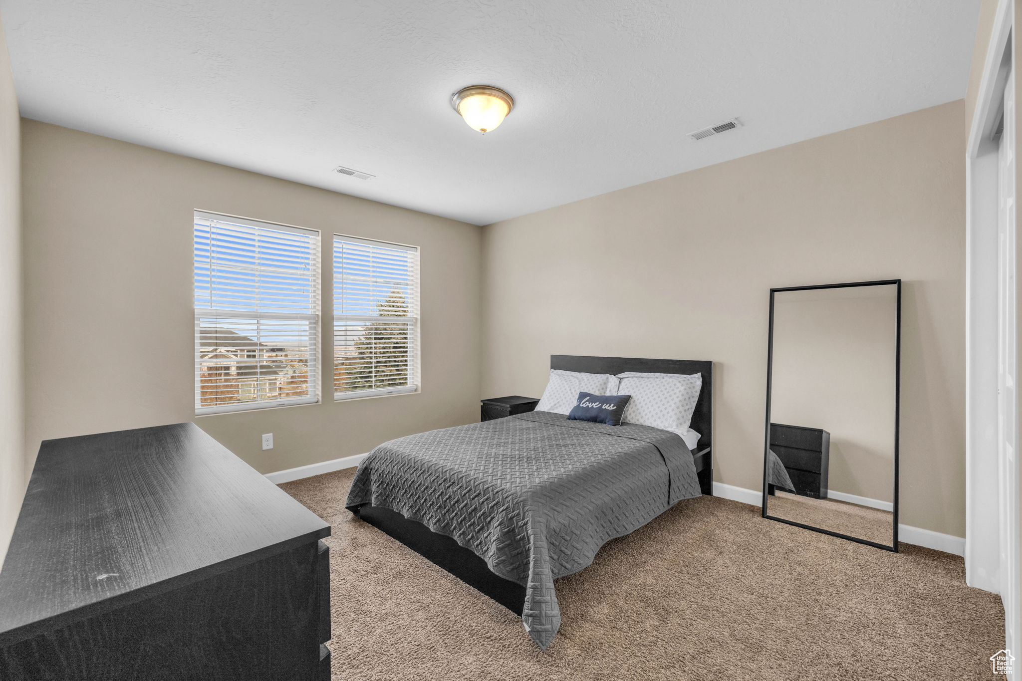 Bedroom with carpet