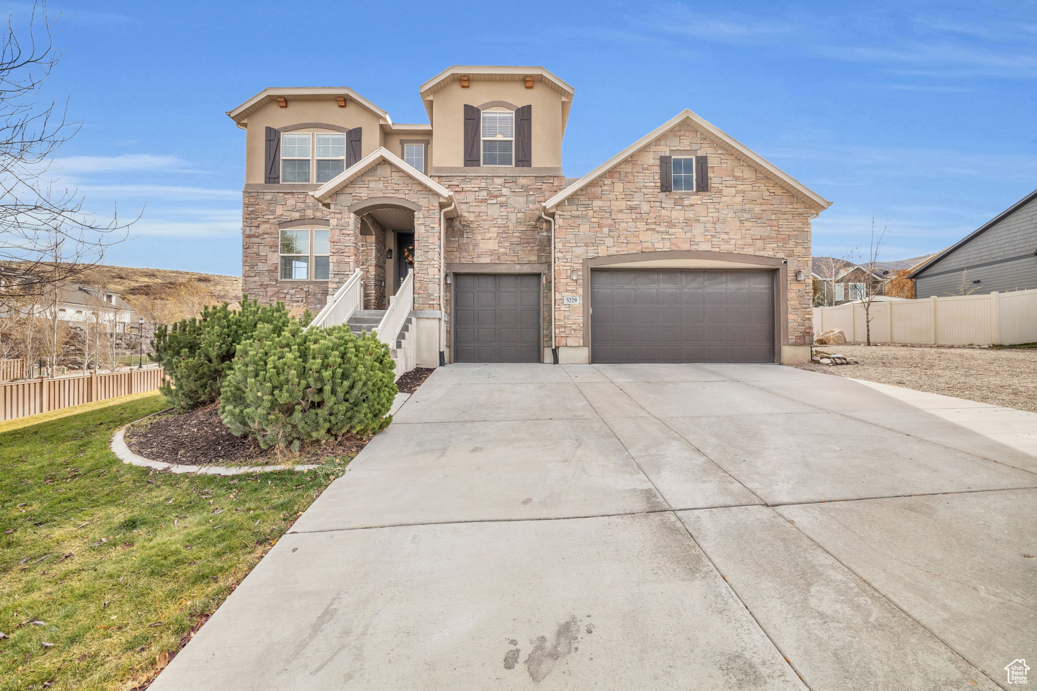 View of front of home featuring a garage