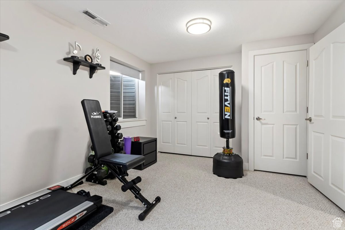 Exercise area with carpet flooring