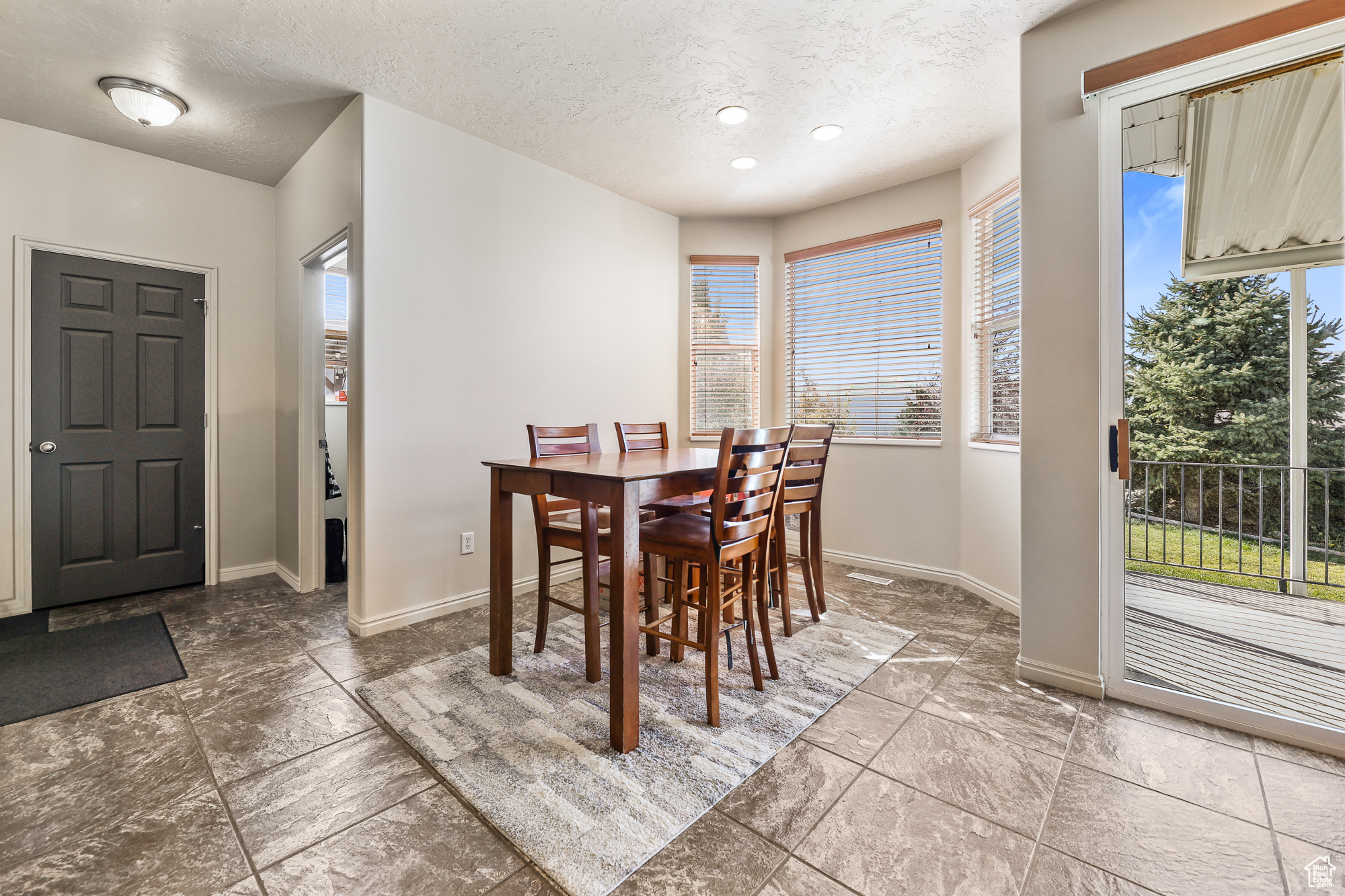 Dining room with a textured ceiling