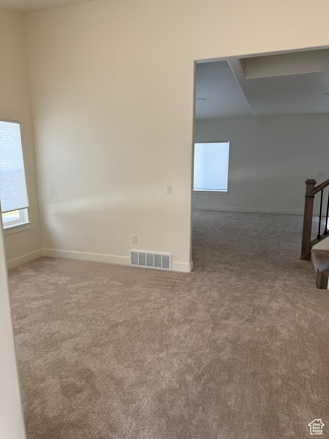 Unfurnished room featuring carpet flooring