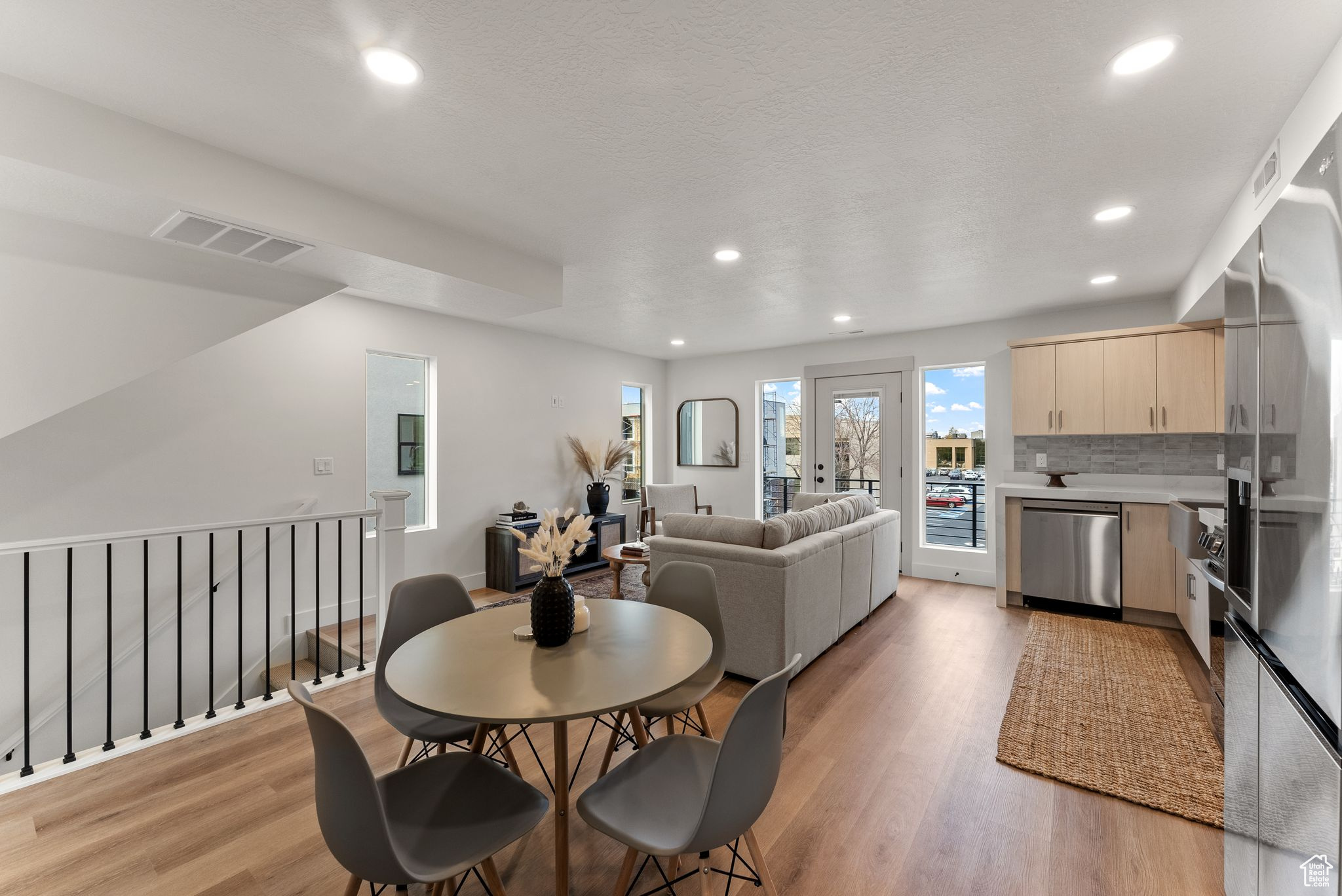 Dining room with light hardwood / wood-style flooring