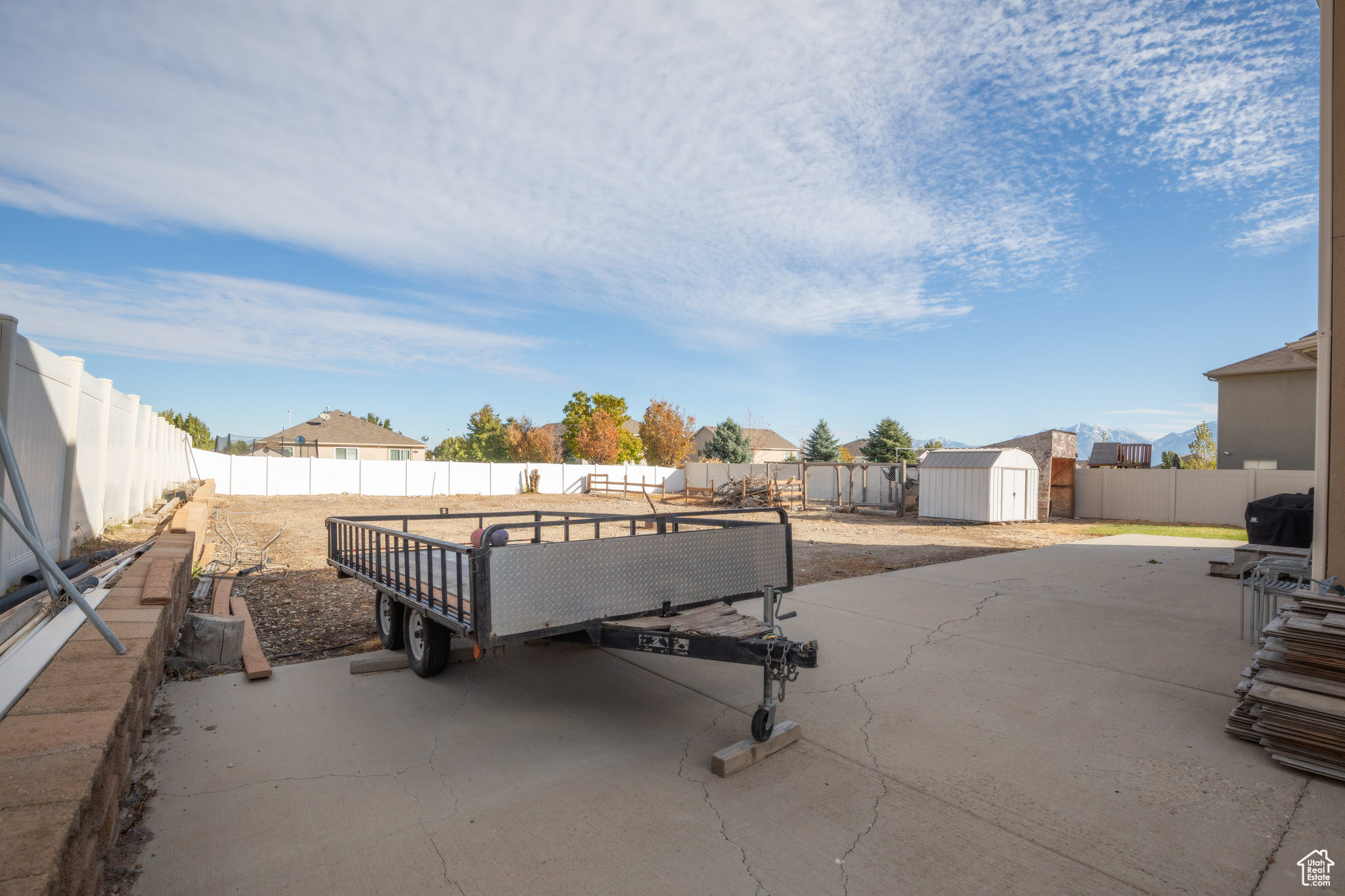 View of patio / terrace with a shed