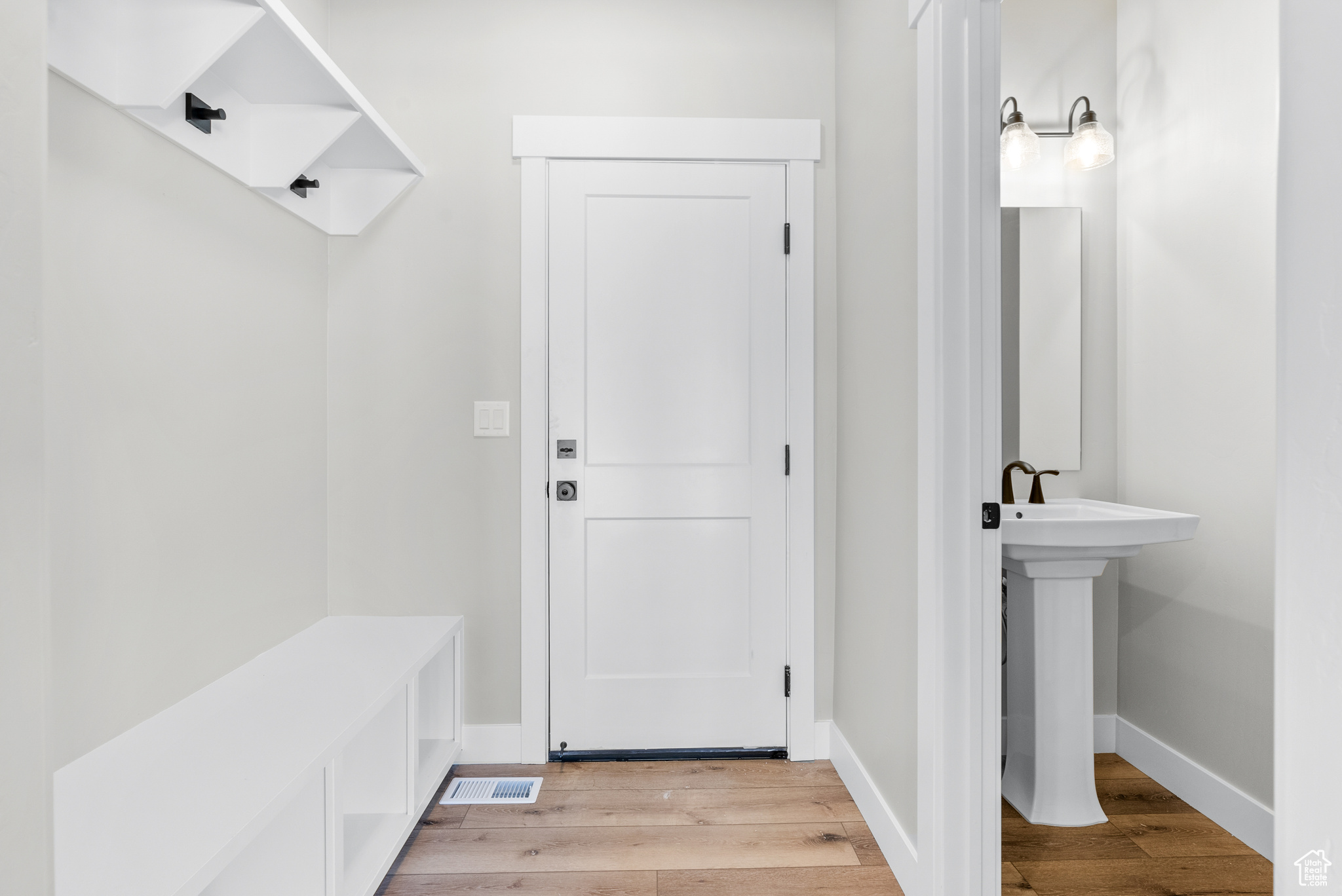 Mudroom featuring light hardwood / wood-style flooring