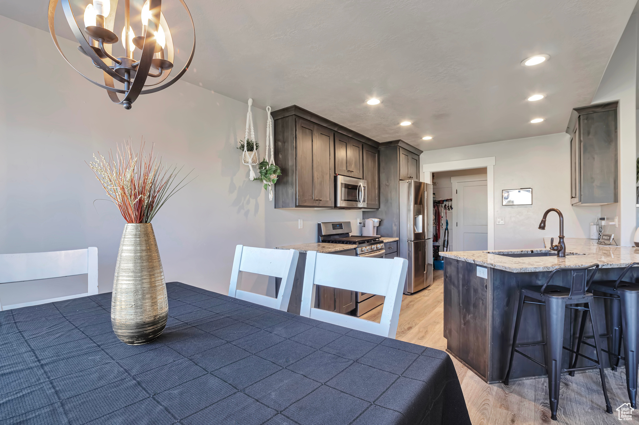 Dining nook with view into kitchen and EXTRA-LARGE pantry.