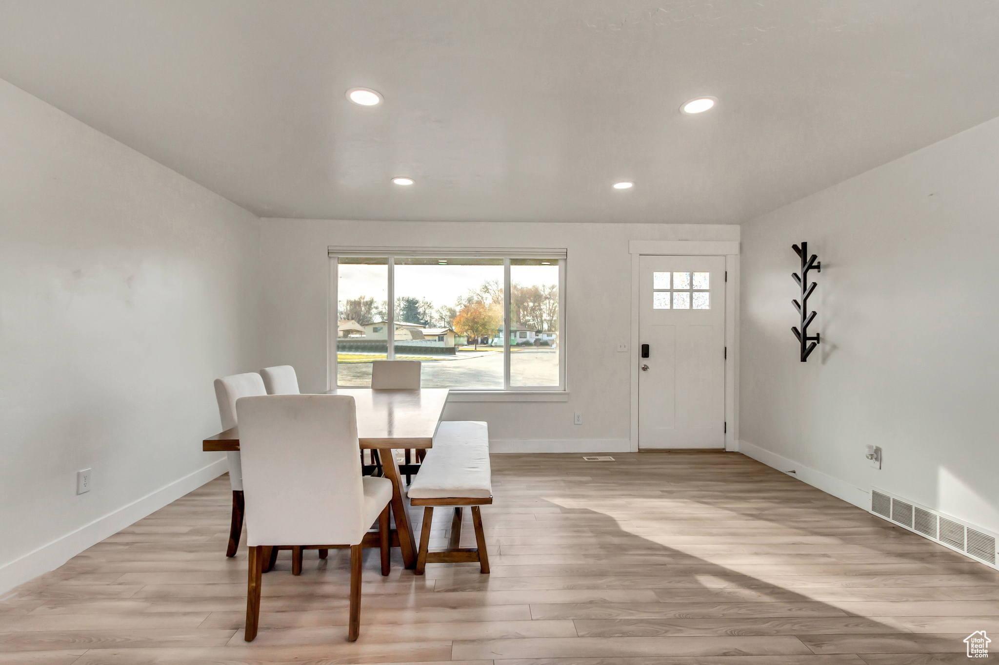 Dining area featuring light wood-type flooring