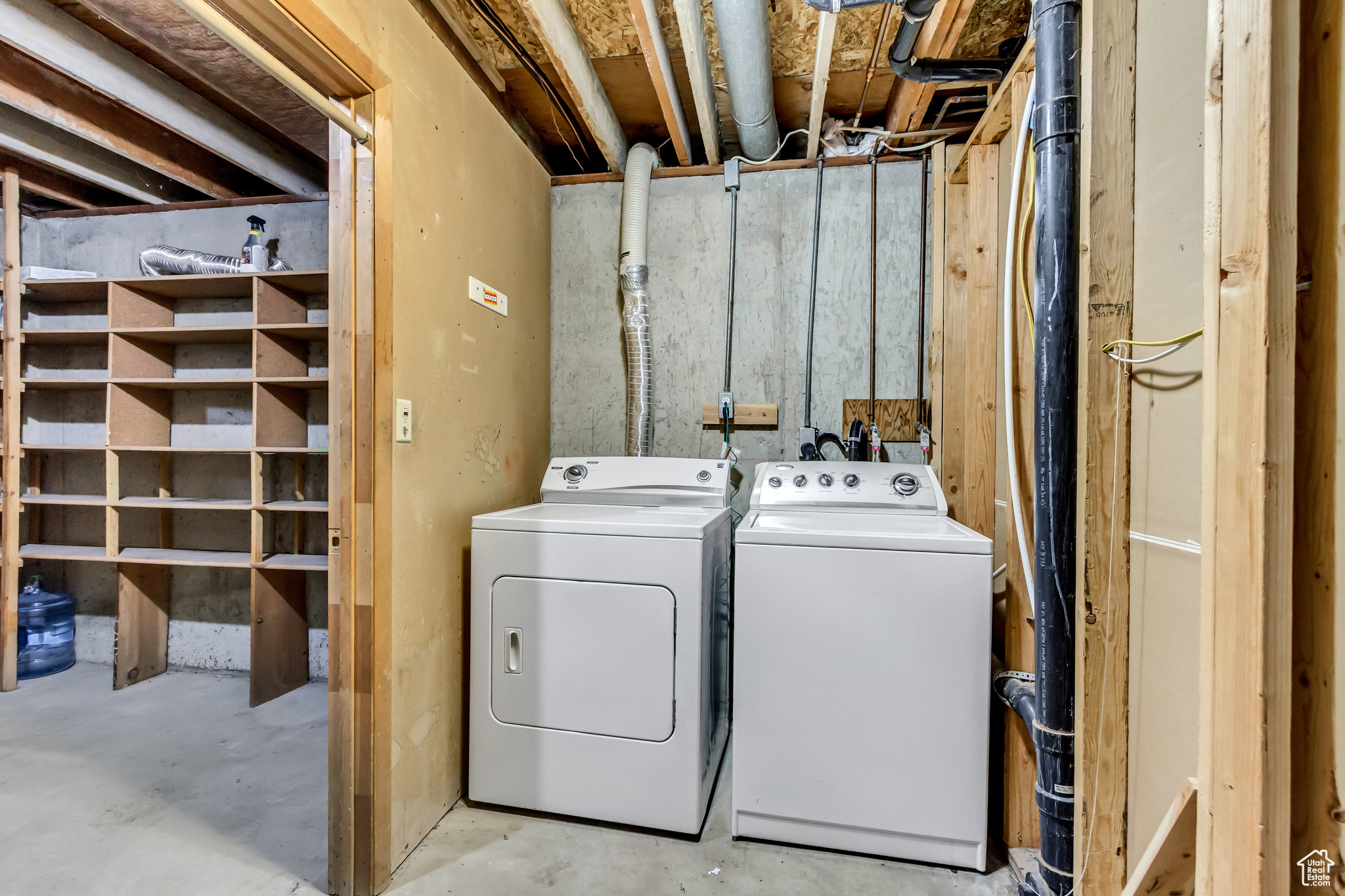 Laundry room with washer and dryer