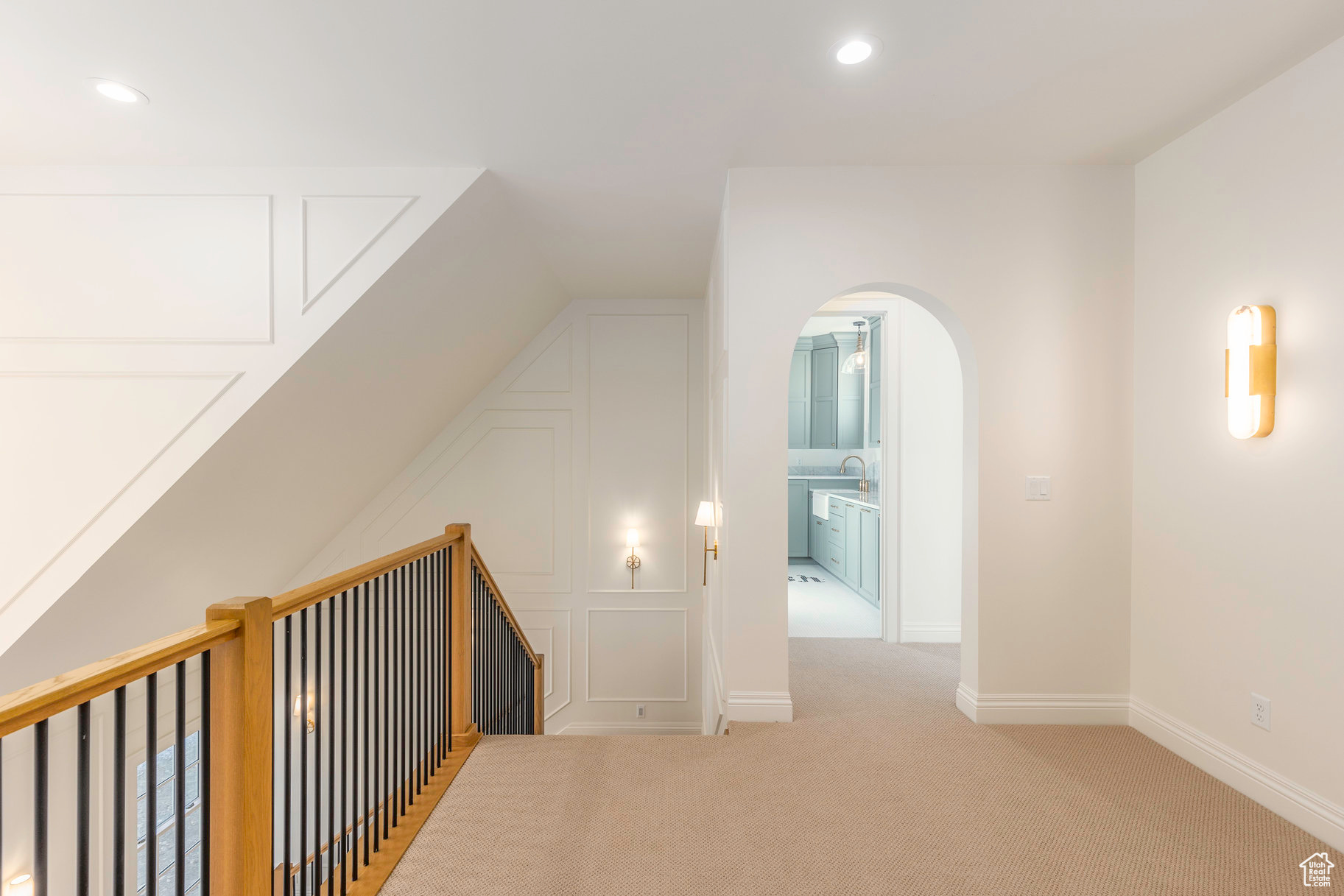 Bonus room with light colored carpet