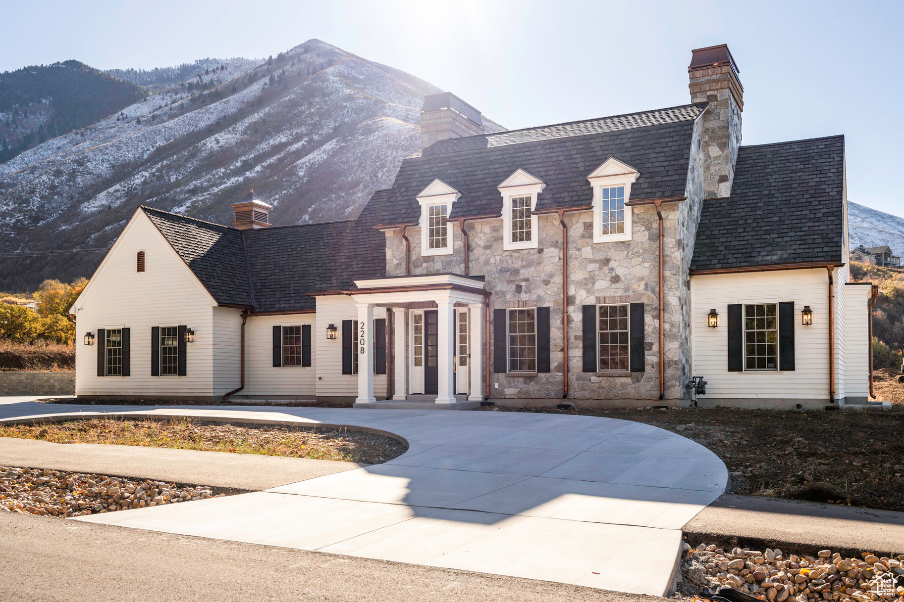 View of front of property featuring a mountain view