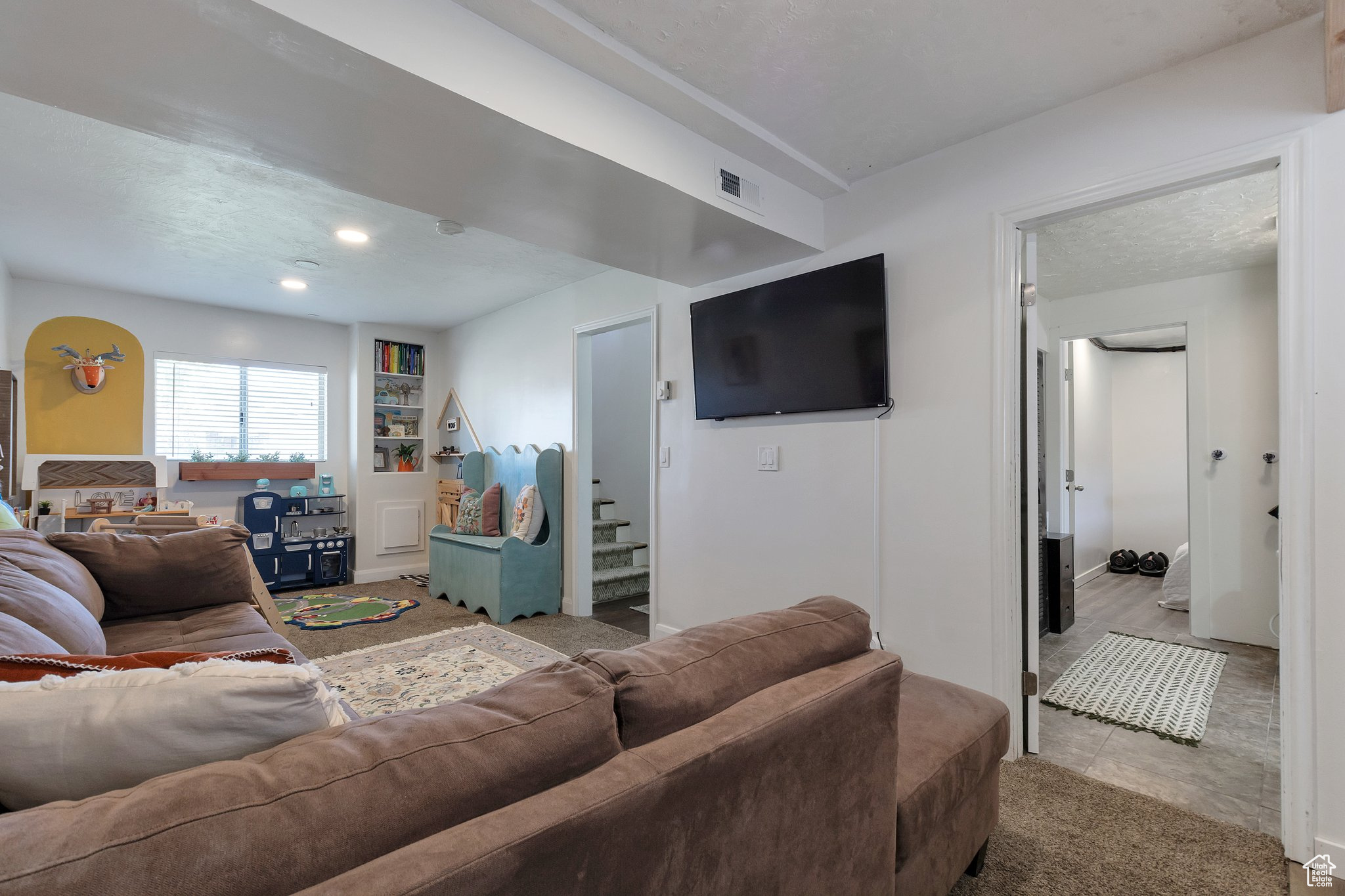 Living room with a textured ceiling