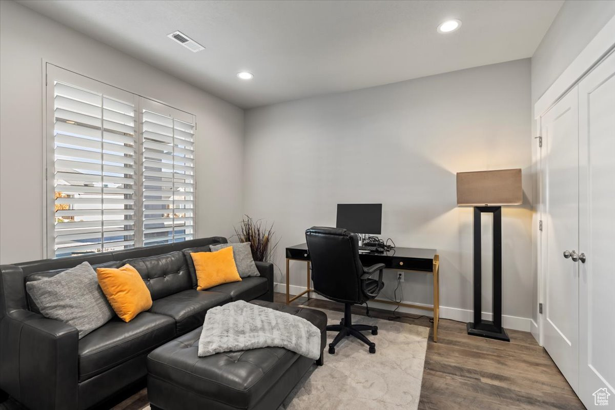 Office area featuring hardwood / wood-style floors