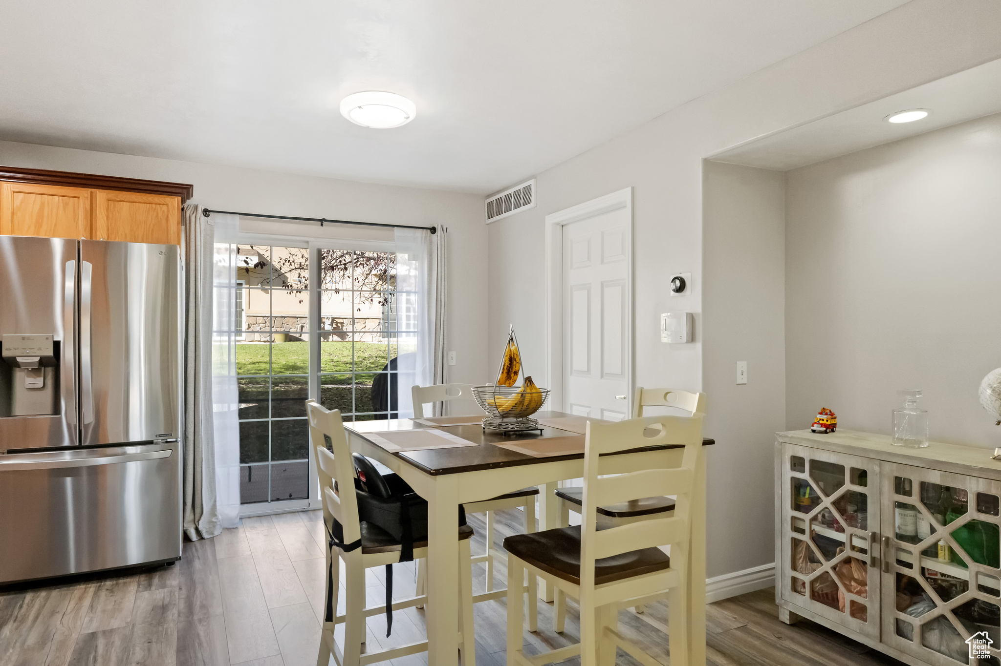 Dining space featuring light wood-type flooring